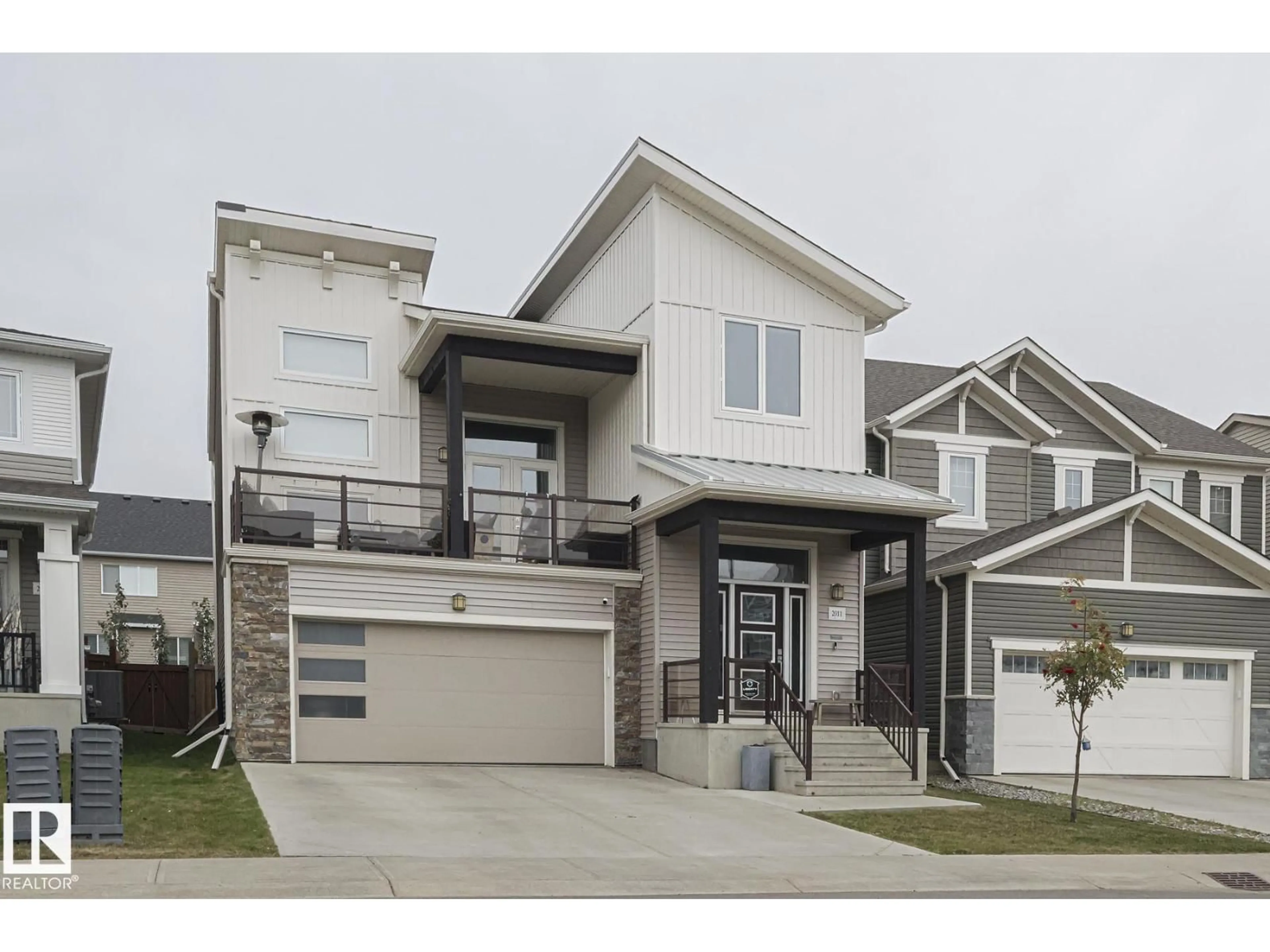Home with vinyl exterior material, street for 2011 201 ST, Edmonton Alberta T6M0X7