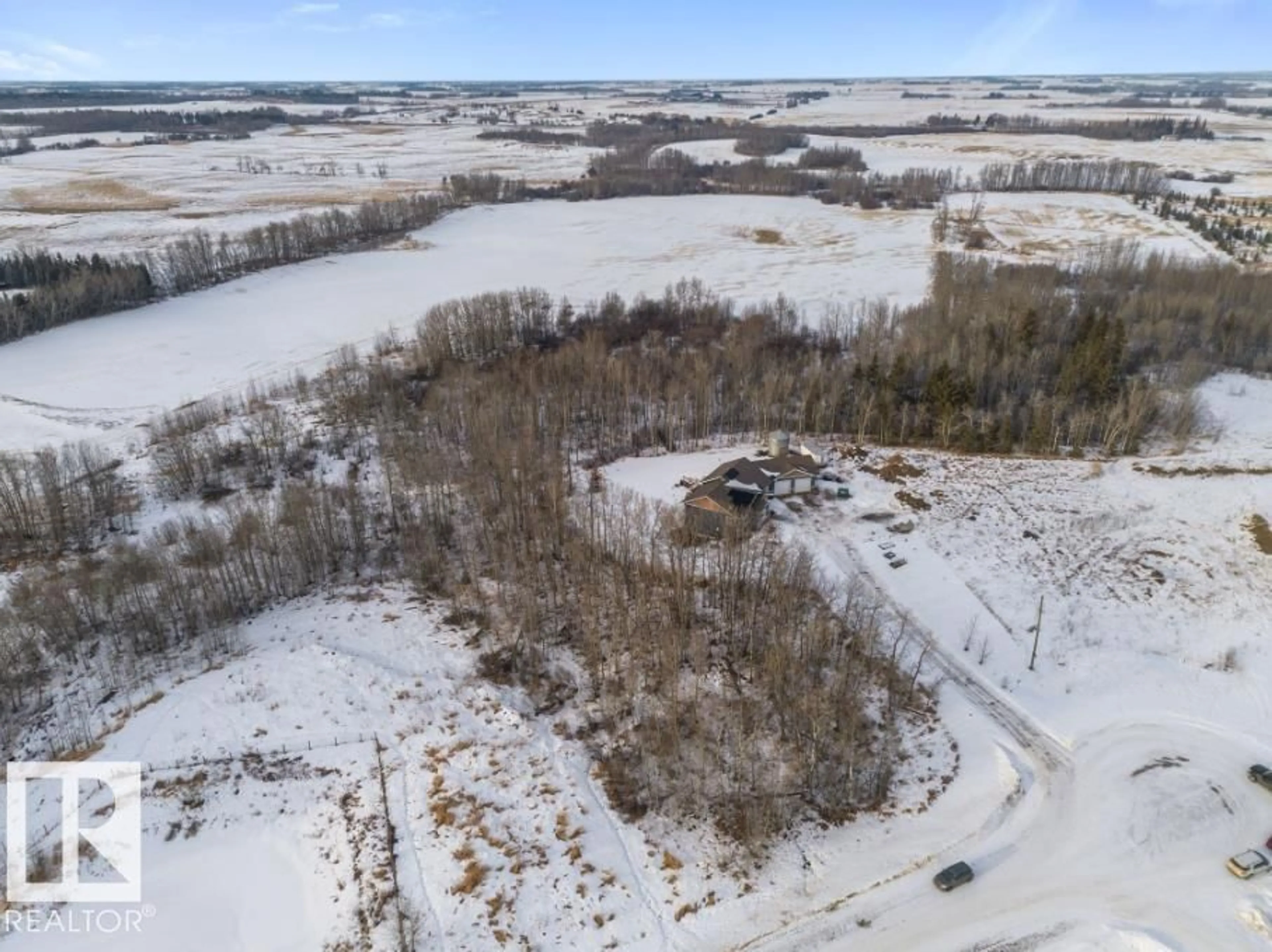 A pic from outside/outdoor area/front of a property/back of a property/a pic from drone, water/lake/river/ocean view for #14 - 241034 TWP ROAD 474, Rural Wetaskiwin County Alberta T0C1Z0