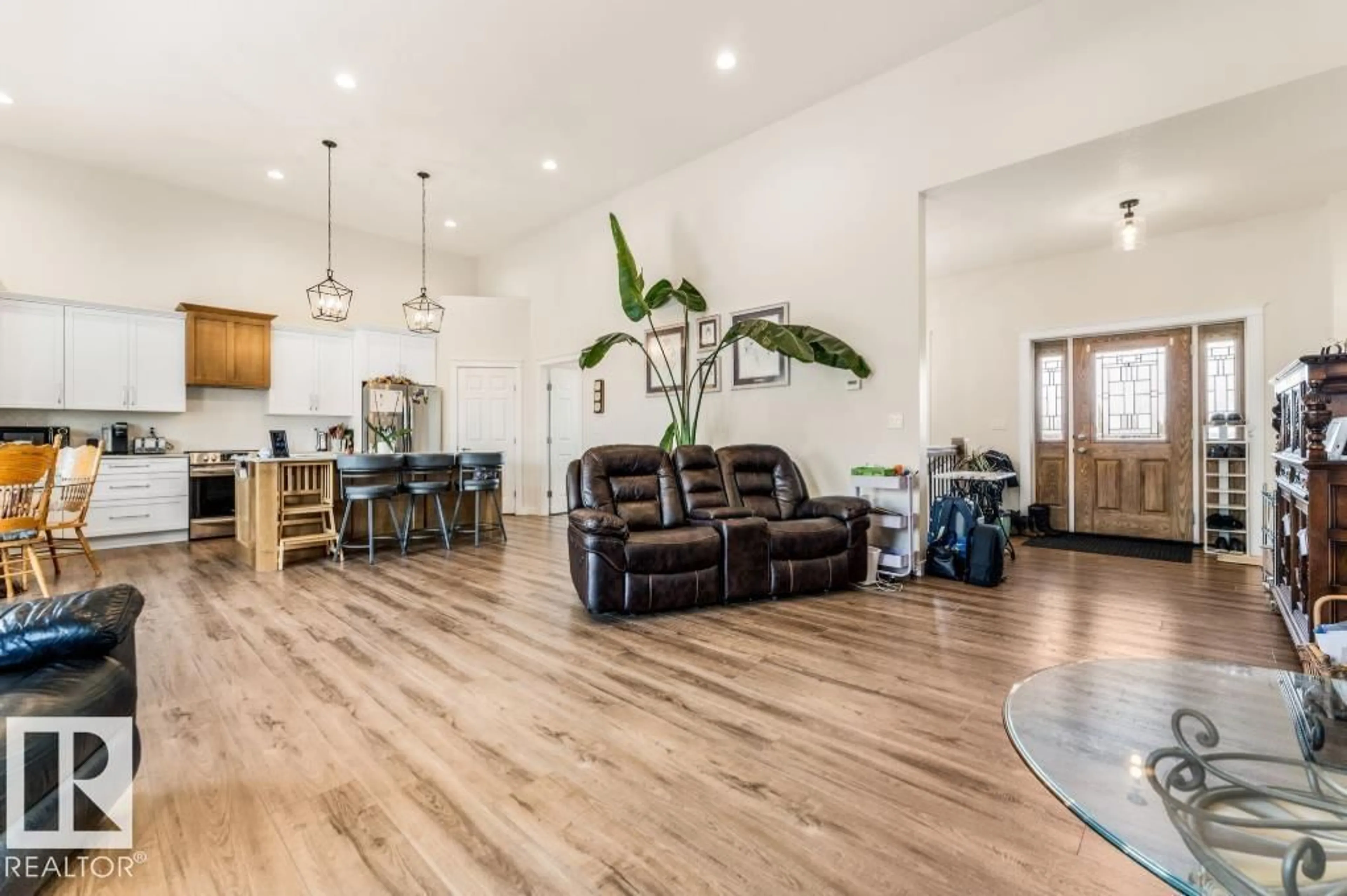 Living room with furniture, wood/laminate floor for #14 - 241034 TWP ROAD 474, Rural Wetaskiwin County Alberta T0C1Z0