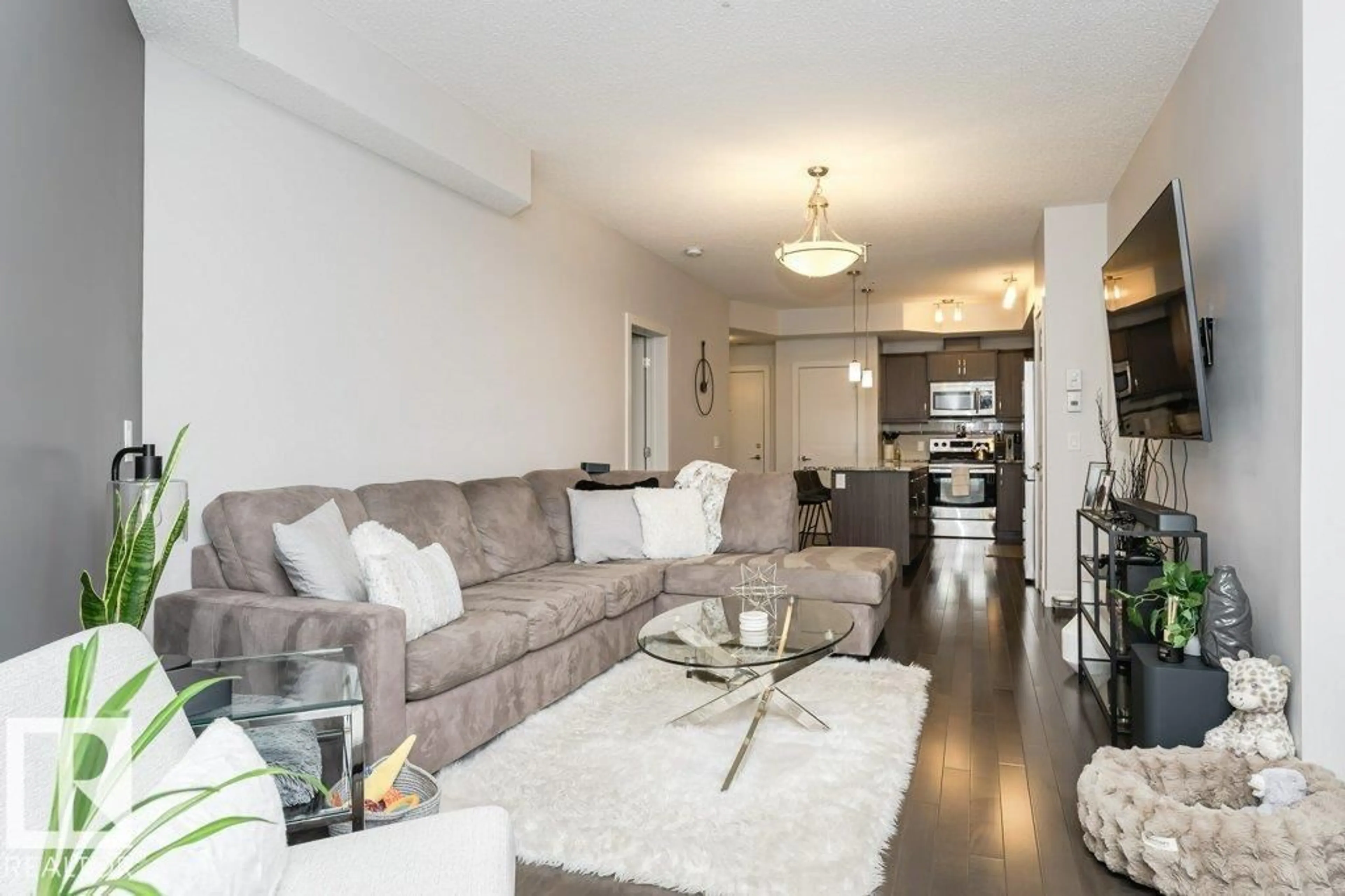 Living room with furniture, unknown for NW - 315 10523 123 ST, Edmonton Alberta T5N1N9