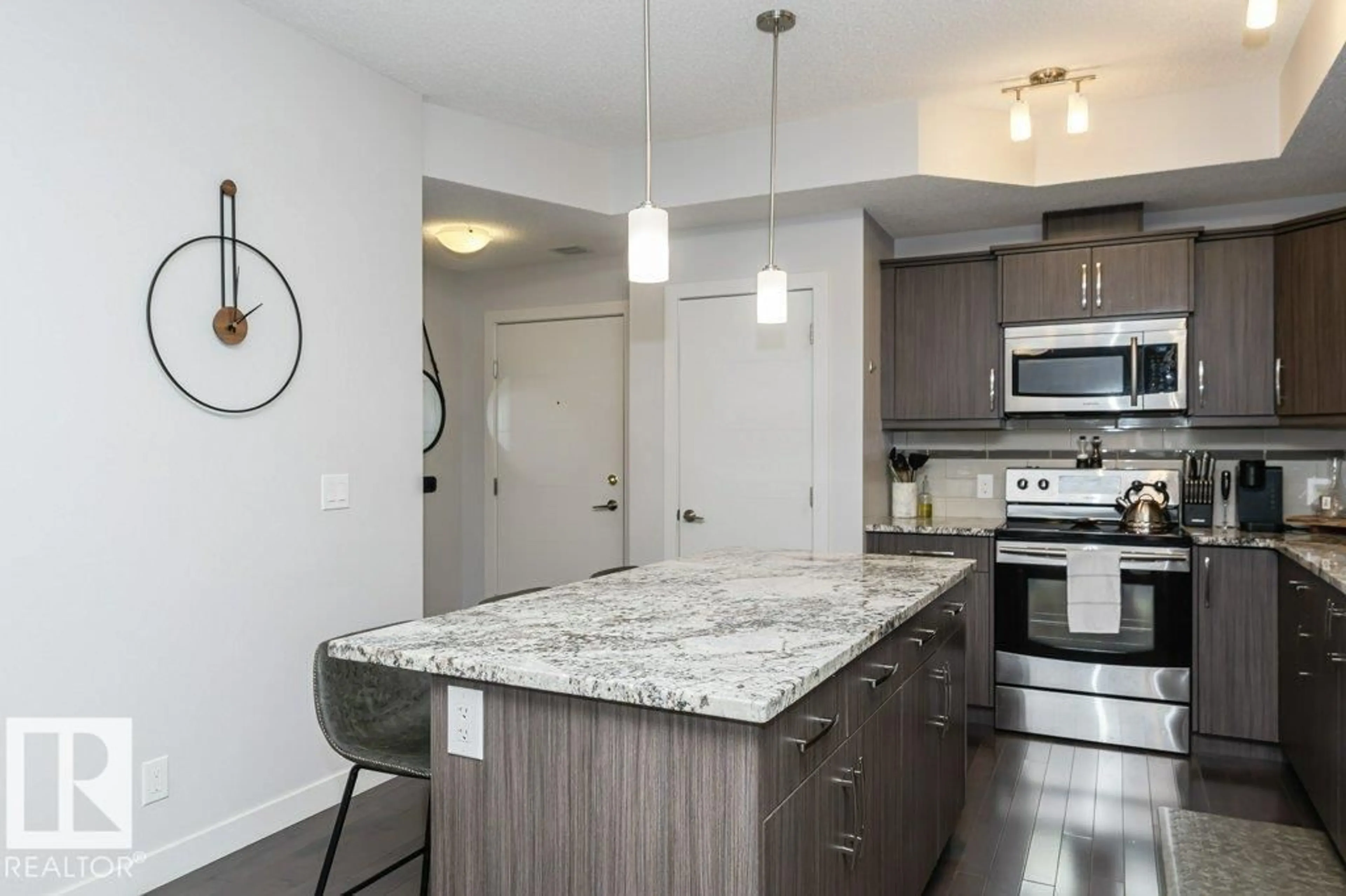 Open concept kitchen, unknown for NW - 315 10523 123 ST, Edmonton Alberta T5N1N9