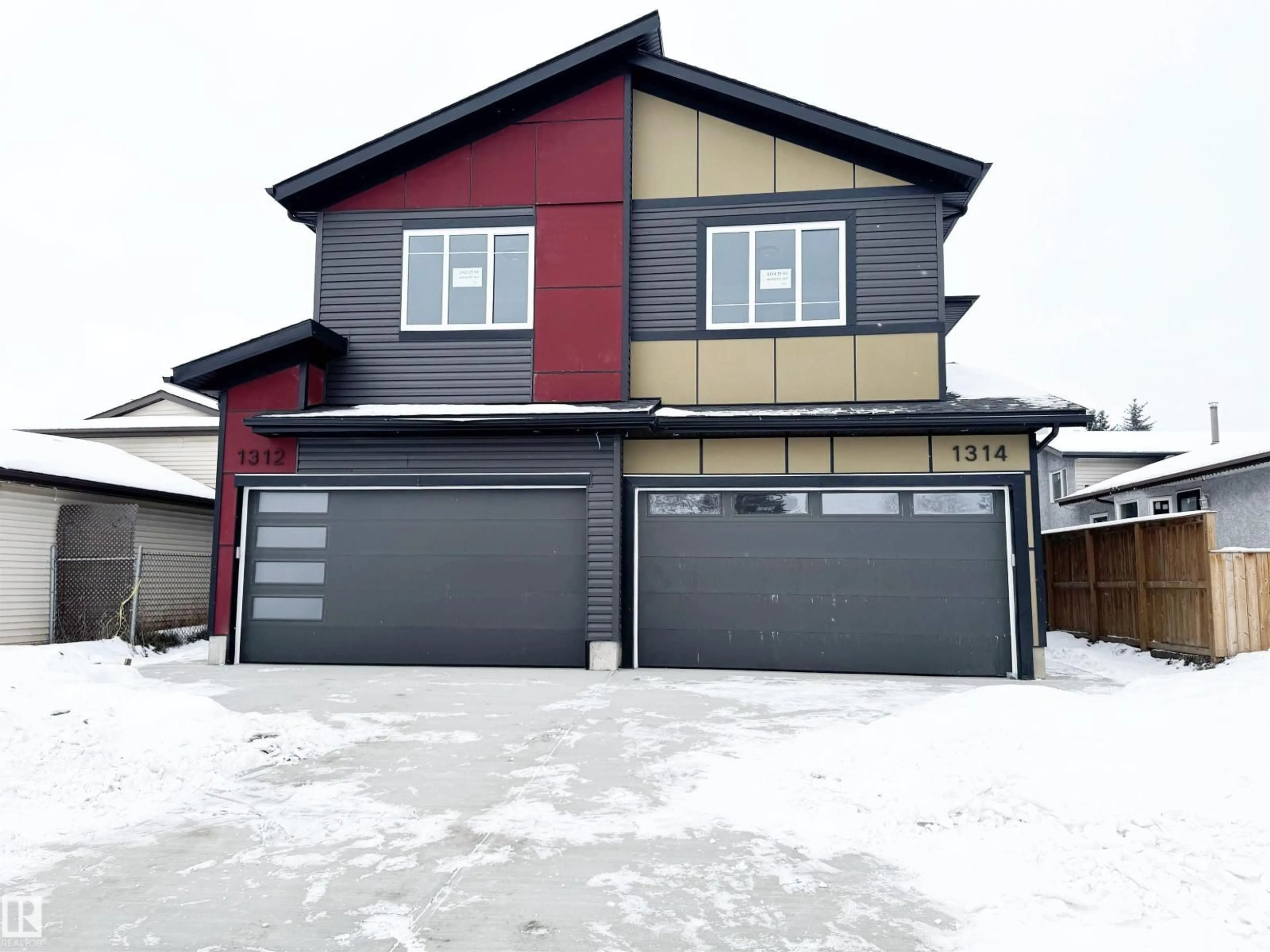 Home with vinyl exterior material, street for NW - 1312 35 ST, Edmonton Alberta T6L3E8