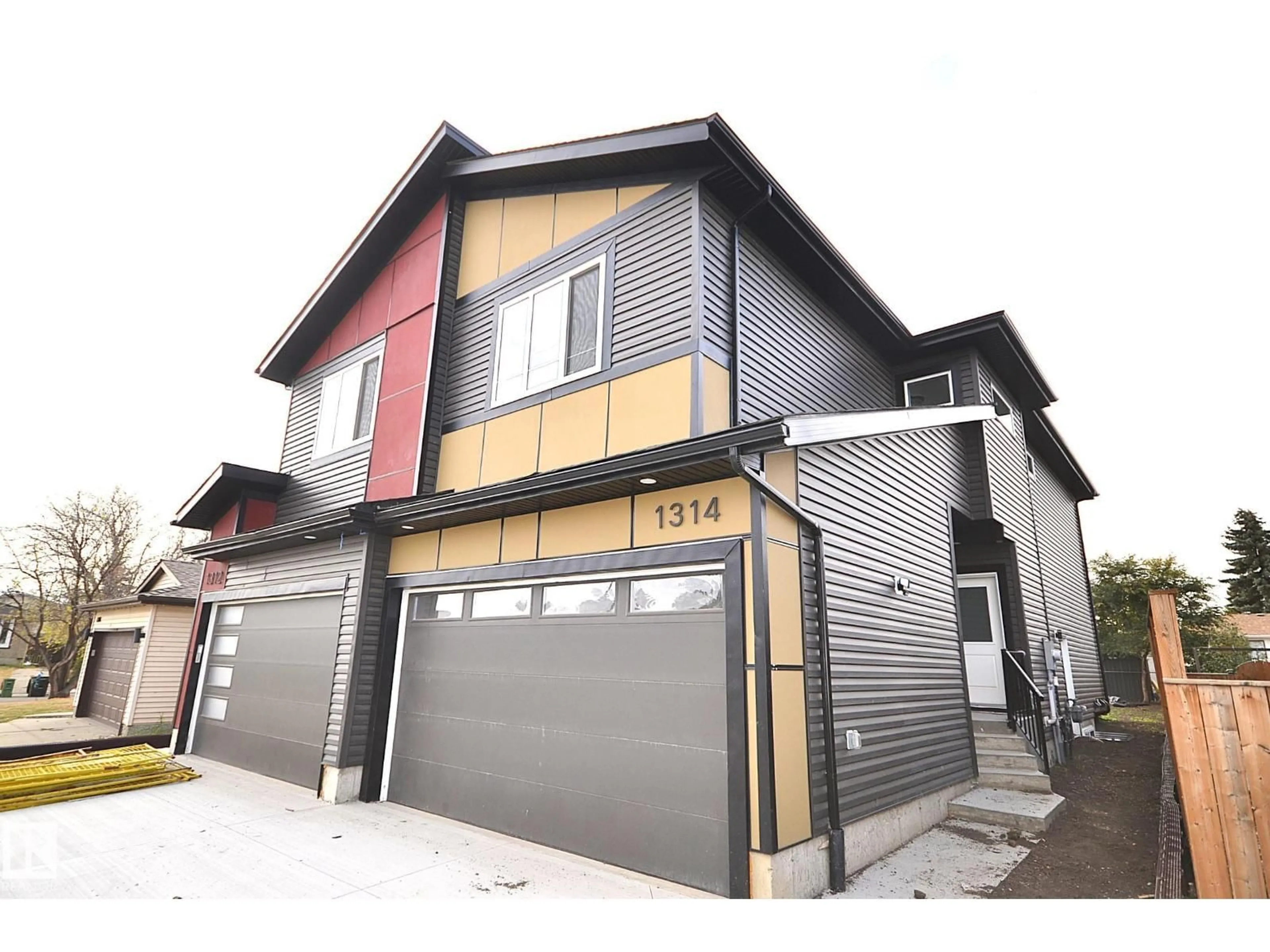 Home with vinyl exterior material, street for 1314 35 ST, Edmonton Alberta T6L3E8