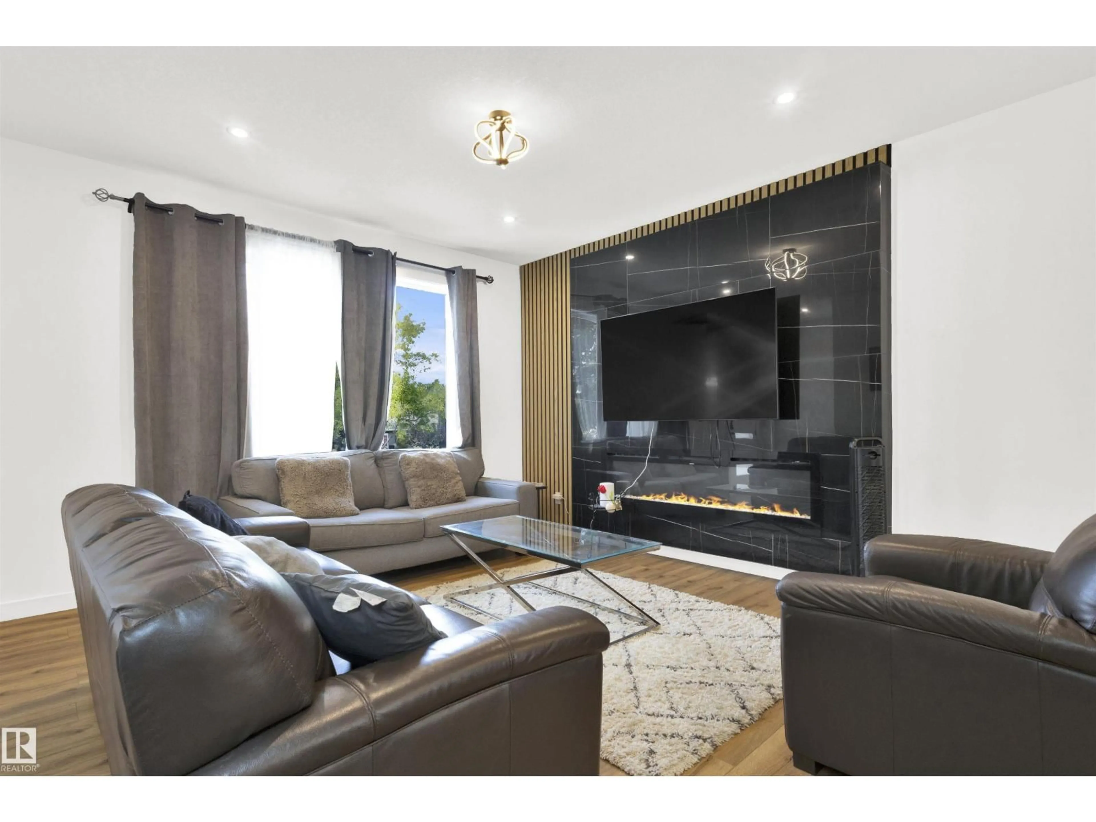 Living room with furniture, unknown for NW - 9559 85 ST, Edmonton Alberta T6C3E1