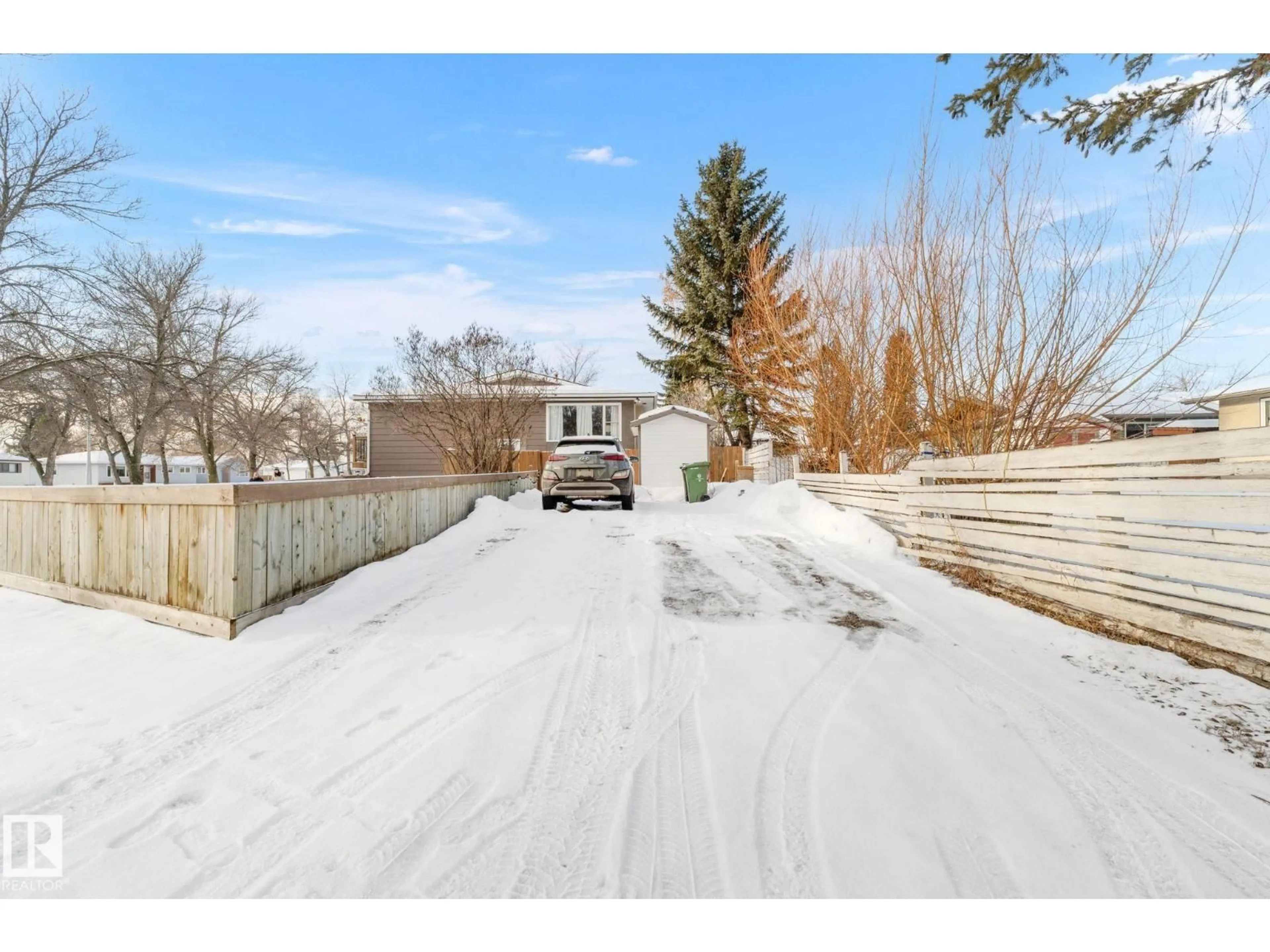 A pic from outside/outdoor area/front of a property/back of a property/a pic from drone, unknown for 9120A 94 AV, Fort Saskatchewan Alberta T8L0J7