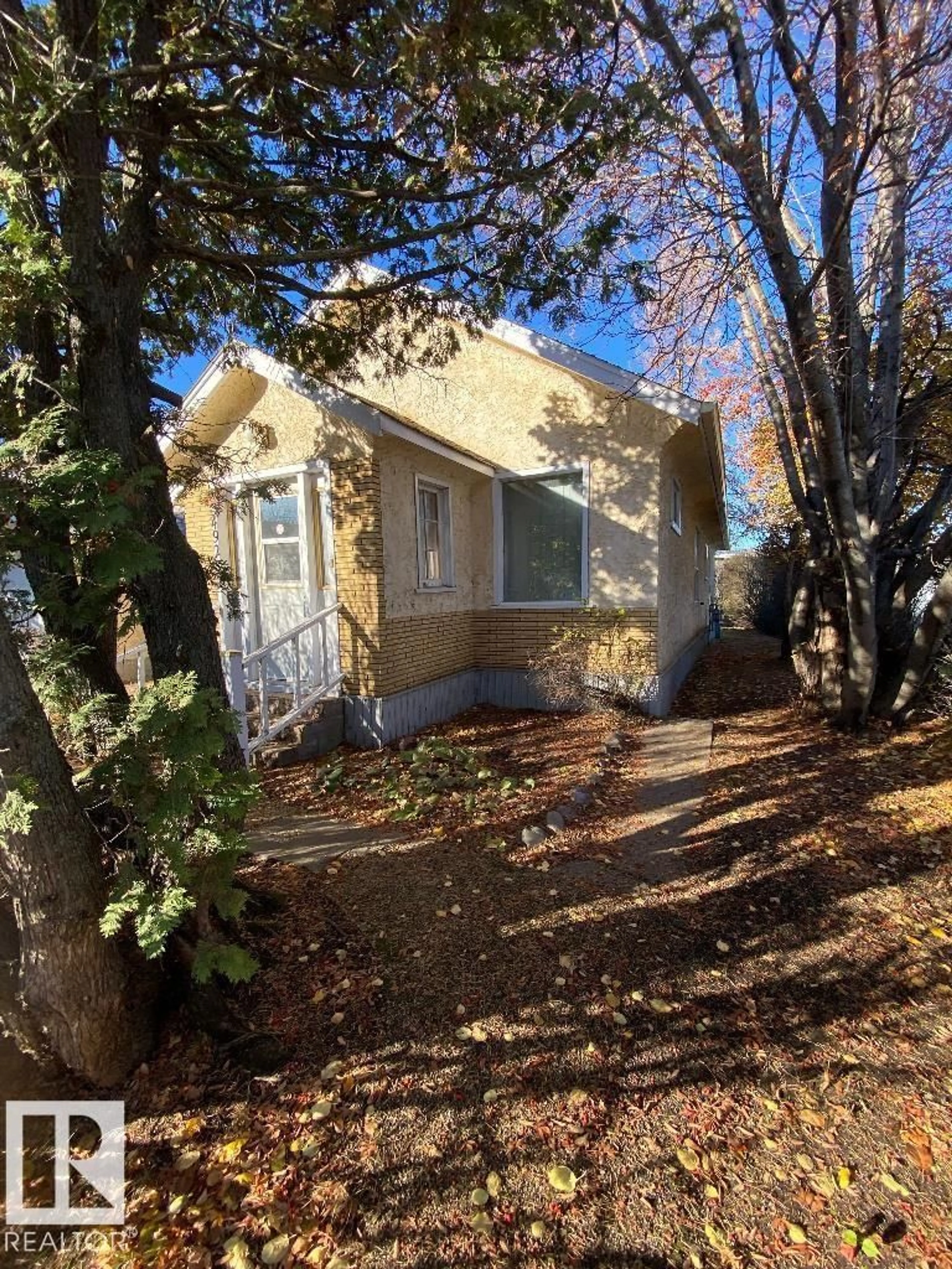 Home with vinyl exterior material, street for 4928 50 ST, Gibbons Alberta T0A1N0