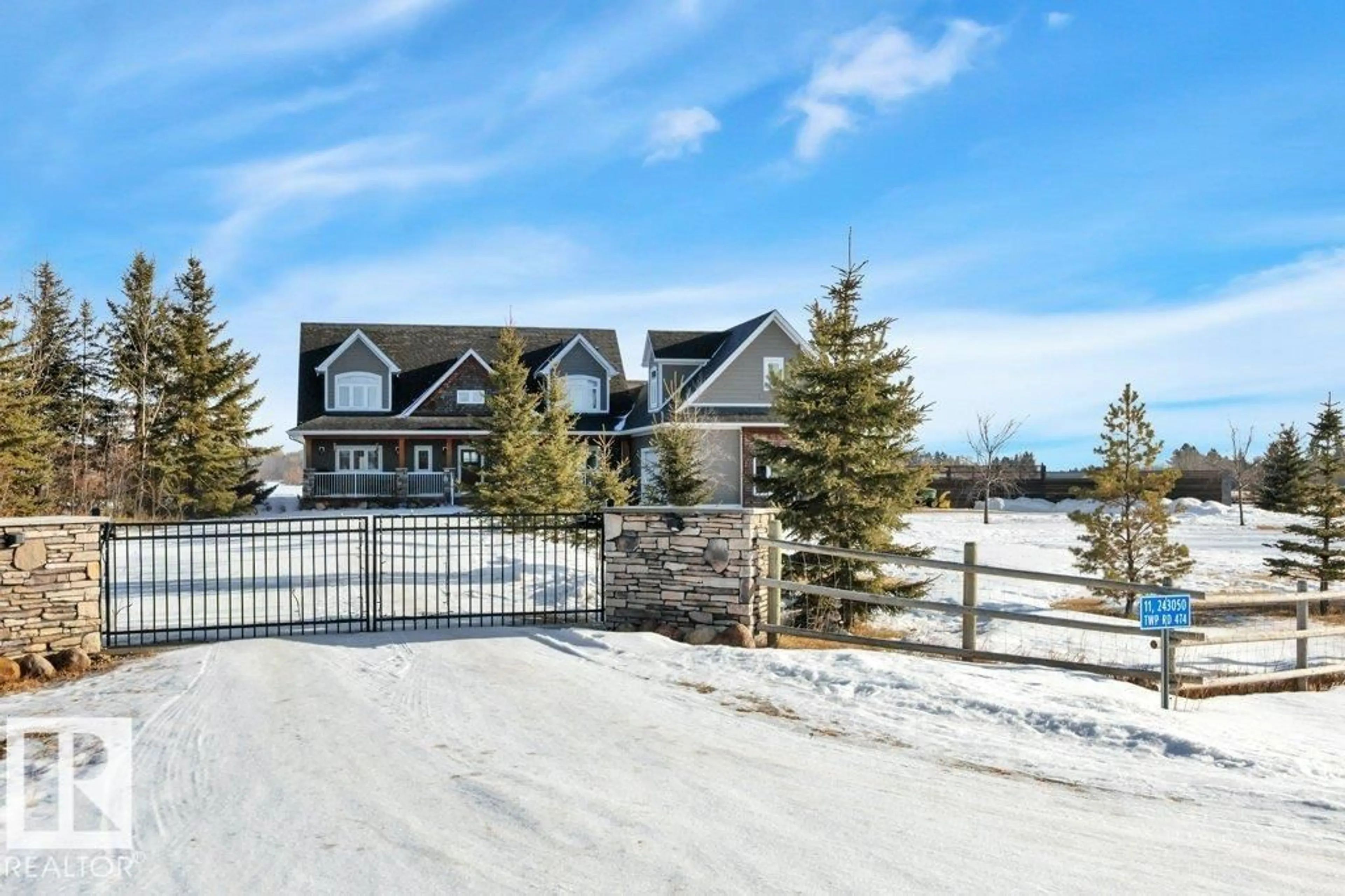 A pic from outside/outdoor area/front of a property/back of a property/a pic from drone, mountain view for 11 243050 TWP ROAD ROAD, Rural Wetaskiwin County Alberta T0C1Z0