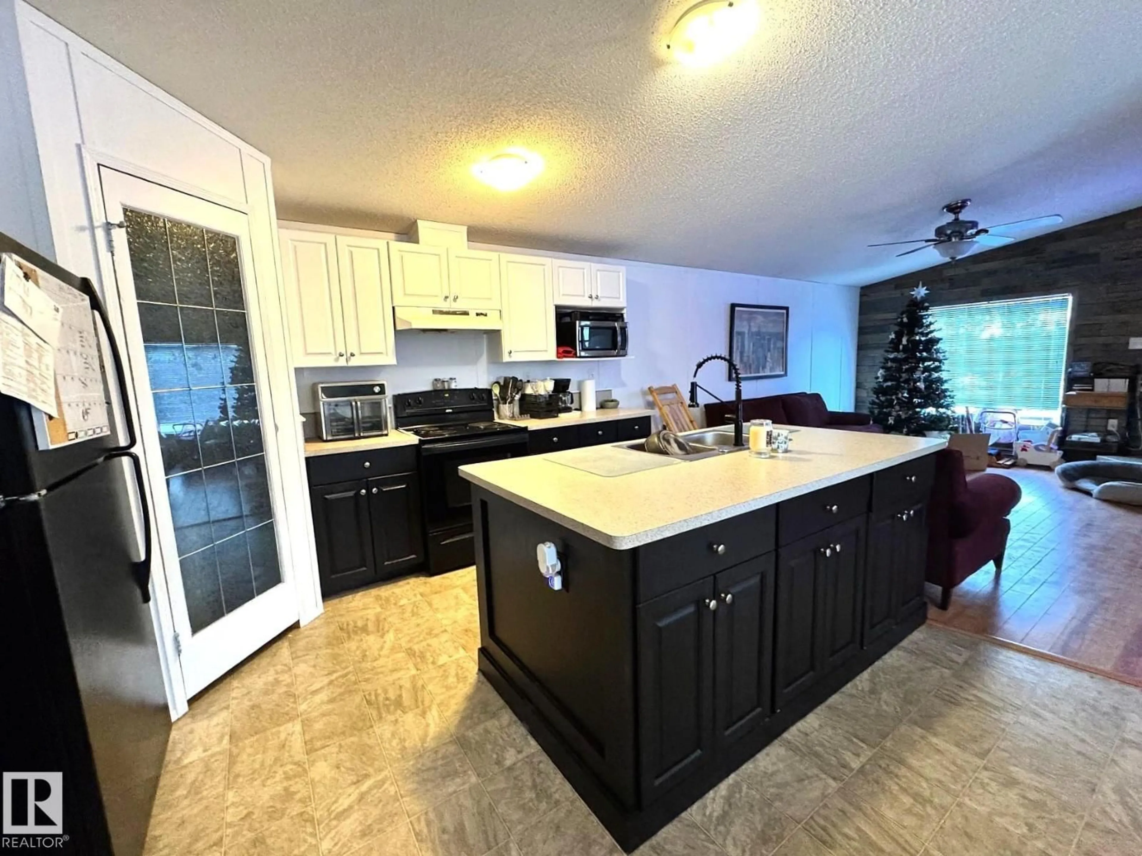 Open concept kitchen, ceramic/tile floor for 4732 54 AV, Wildwood Alberta T0E2M0