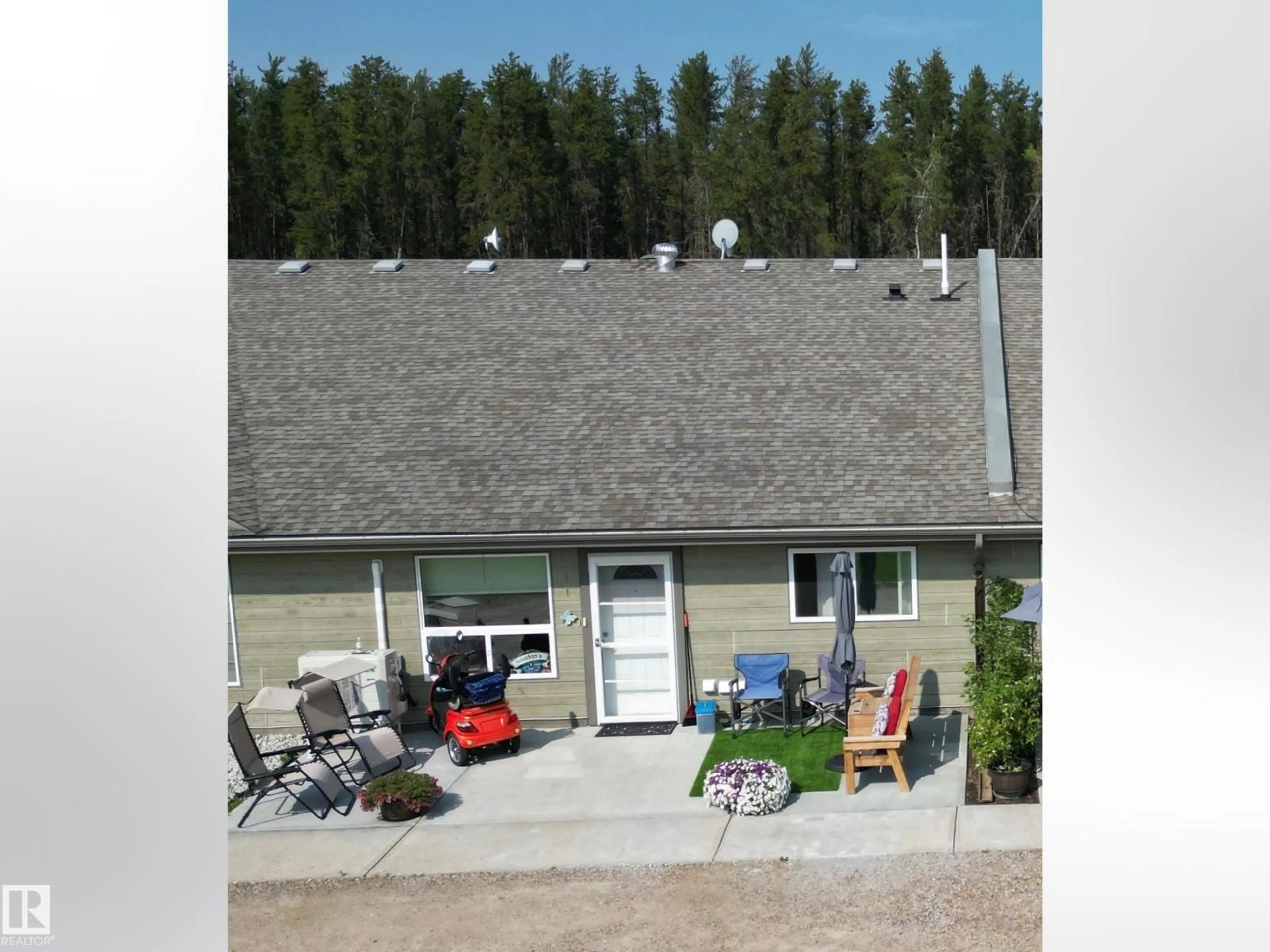 A pic from outside/outdoor area/front of a property/back of a property/a pic from drone, mountain view for 5011 PINE DR, Cherry Grove Alberta T0A0T0