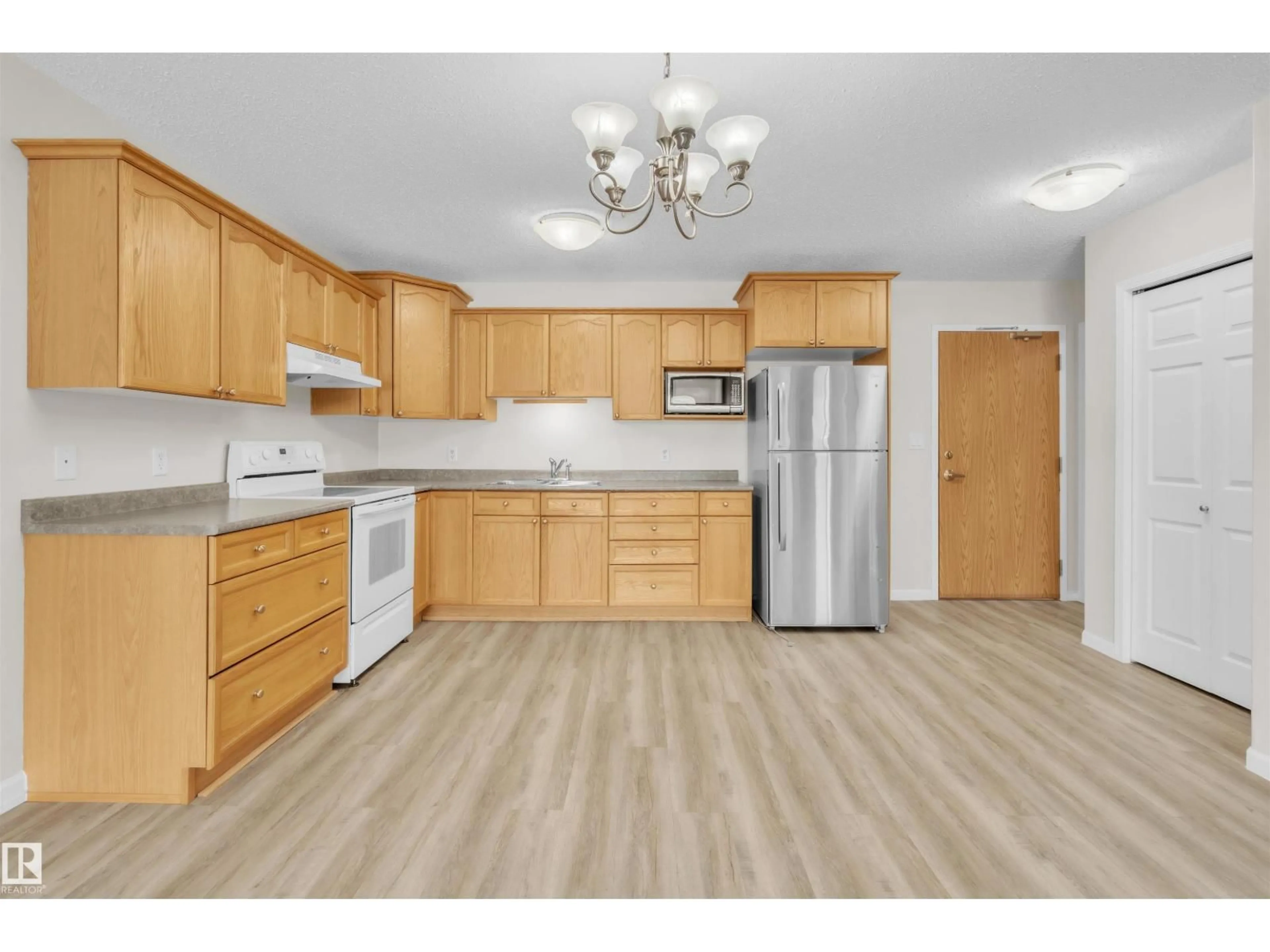 Standard kitchen, wood/laminate floor for 5011 PINE DR, Cherry Grove Alberta T0A0T0