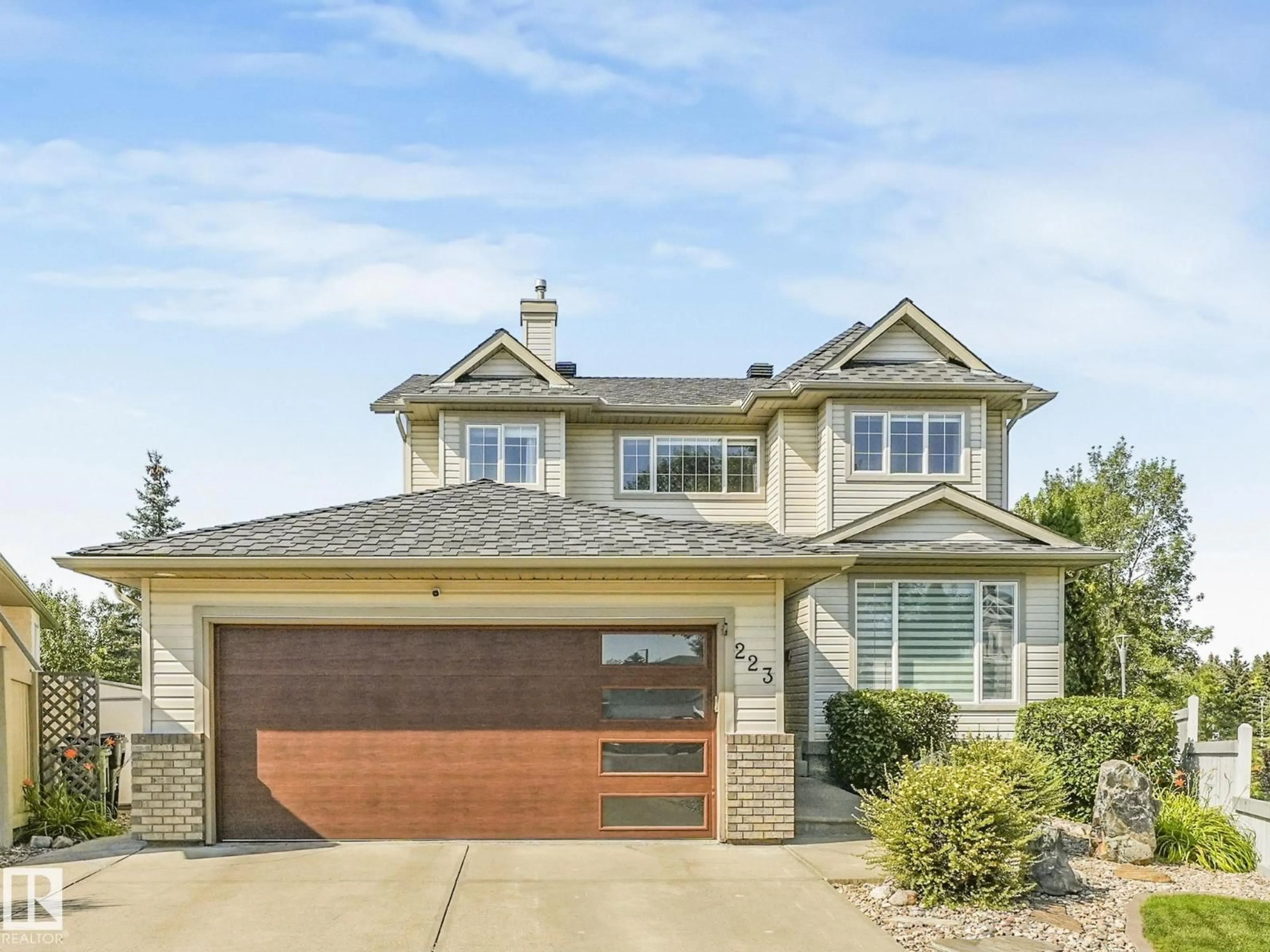 Home with vinyl exterior material, street for 223 ORMSBY ROAD, Edmonton Alberta T5T5X5