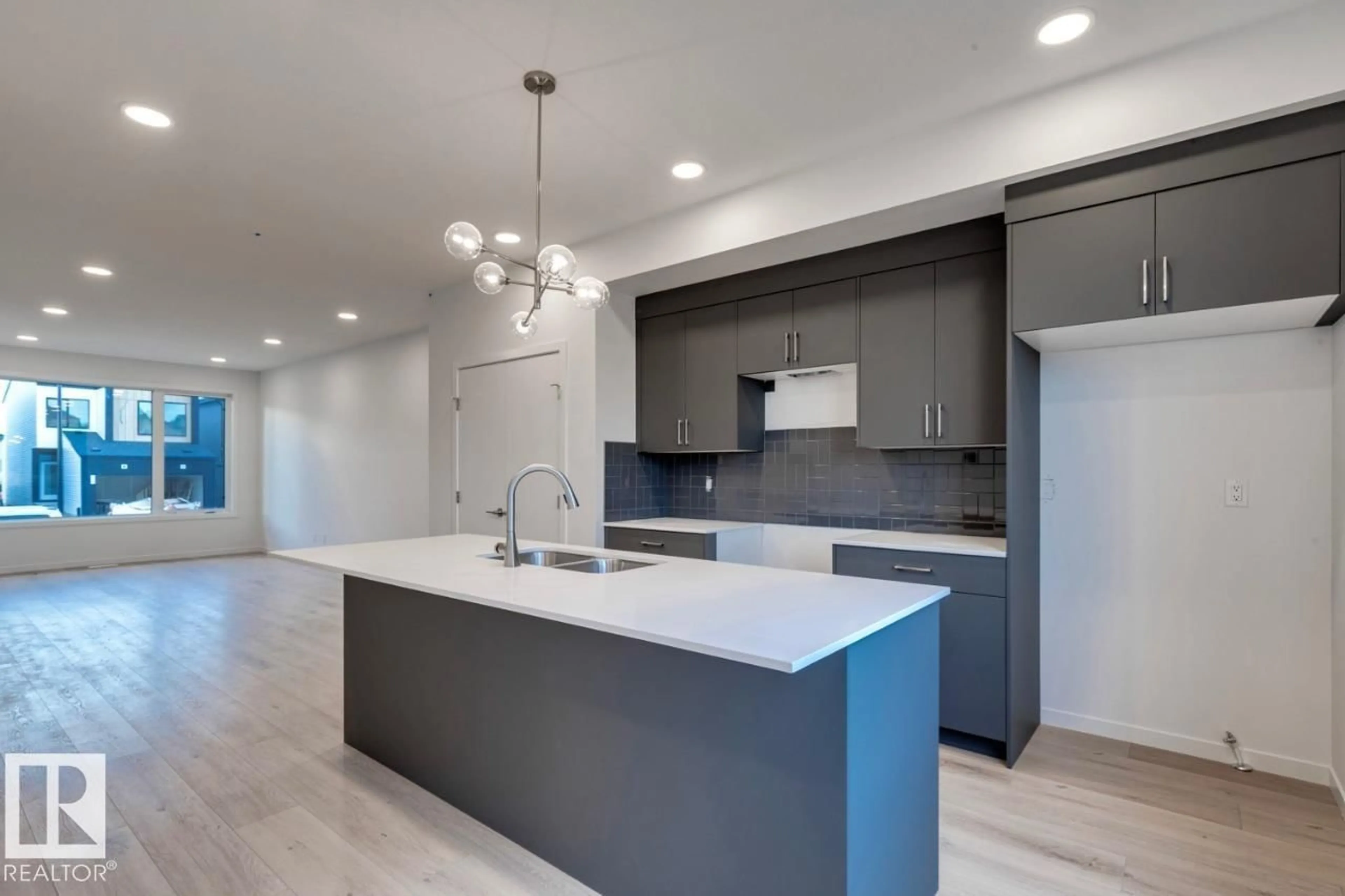 Open concept kitchen, unknown for LI SW - 7528 KLAPSTEIN LINK, Edmonton Alberta T6W5S7
