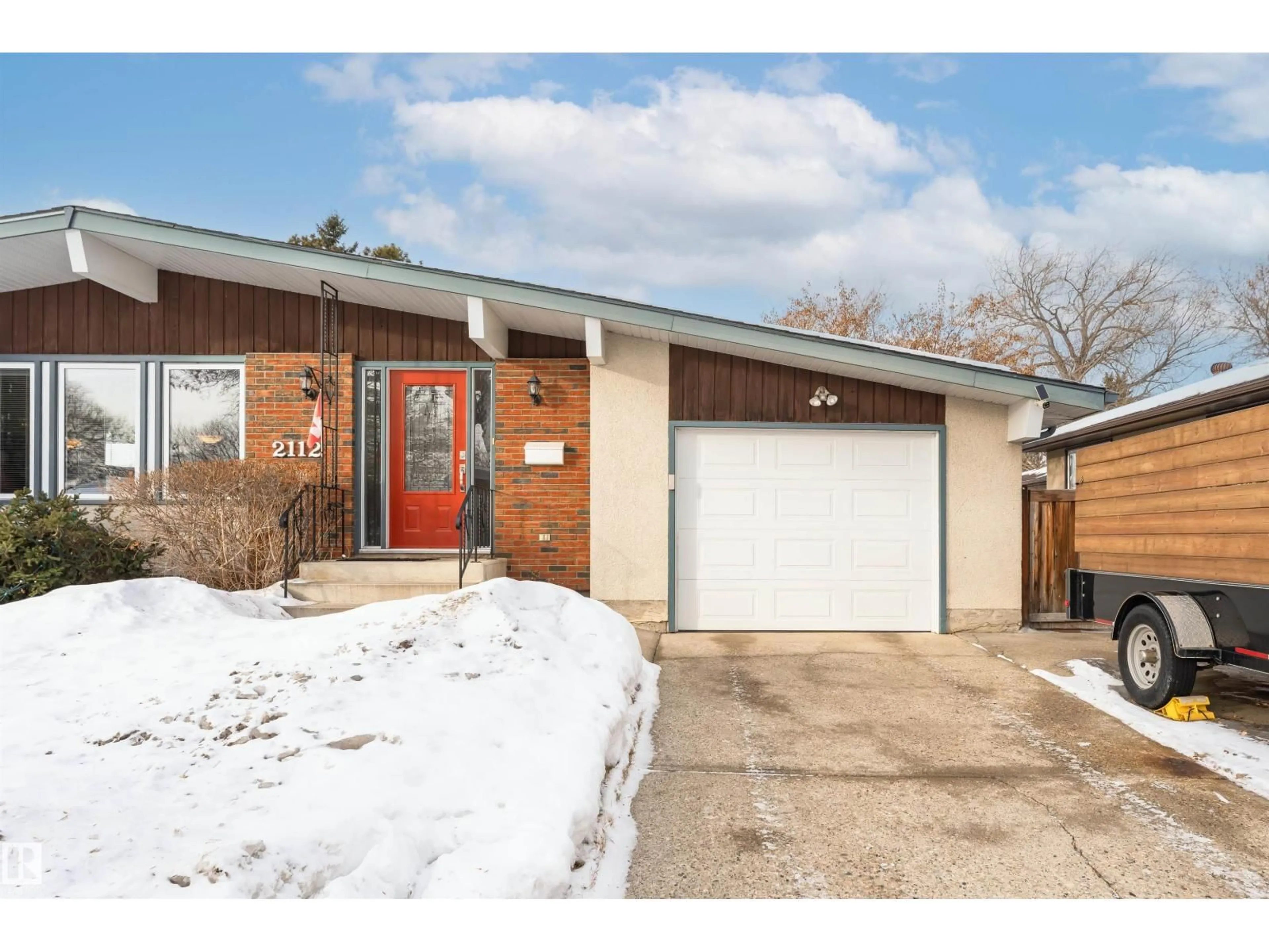 Home with brick exterior material, street for 2112 67 ST, Edmonton Alberta T6K2H8