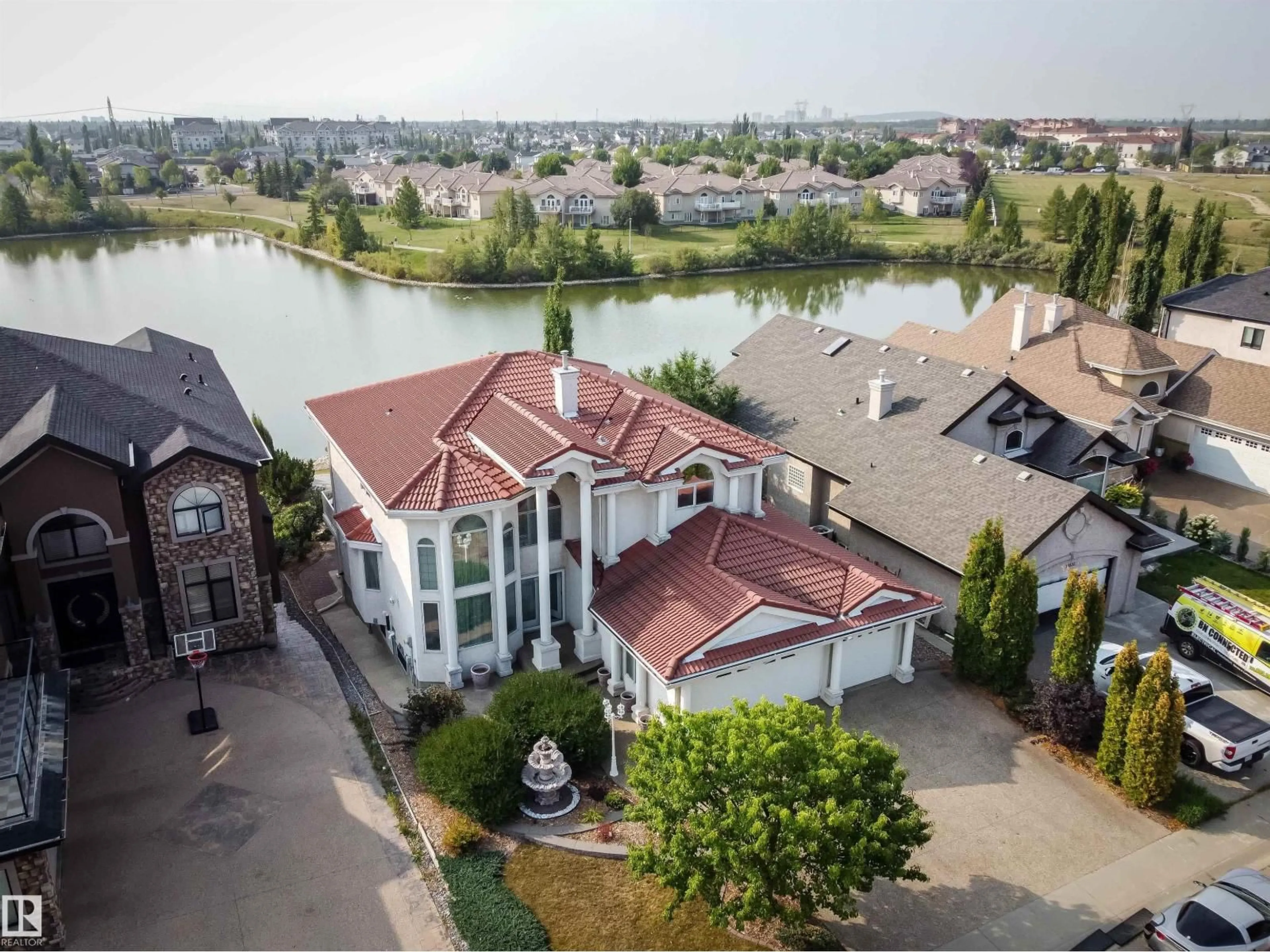 A pic from outside/outdoor area/front of a property/back of a property/a pic from drone, water/lake/river/ocean view for NW - 13527 158 AV, Edmonton Alberta T6V1S3