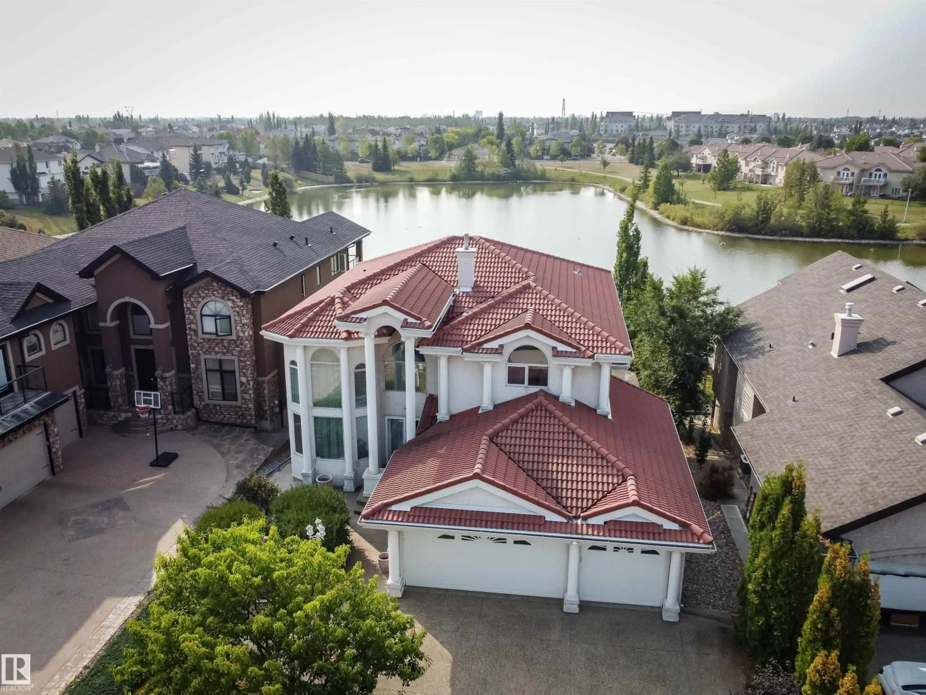 A pic from outside/outdoor area/front of a property/back of a property/a pic from drone, water/lake/river/ocean view for NW - 13527 158 AV, Edmonton Alberta T6V1S3