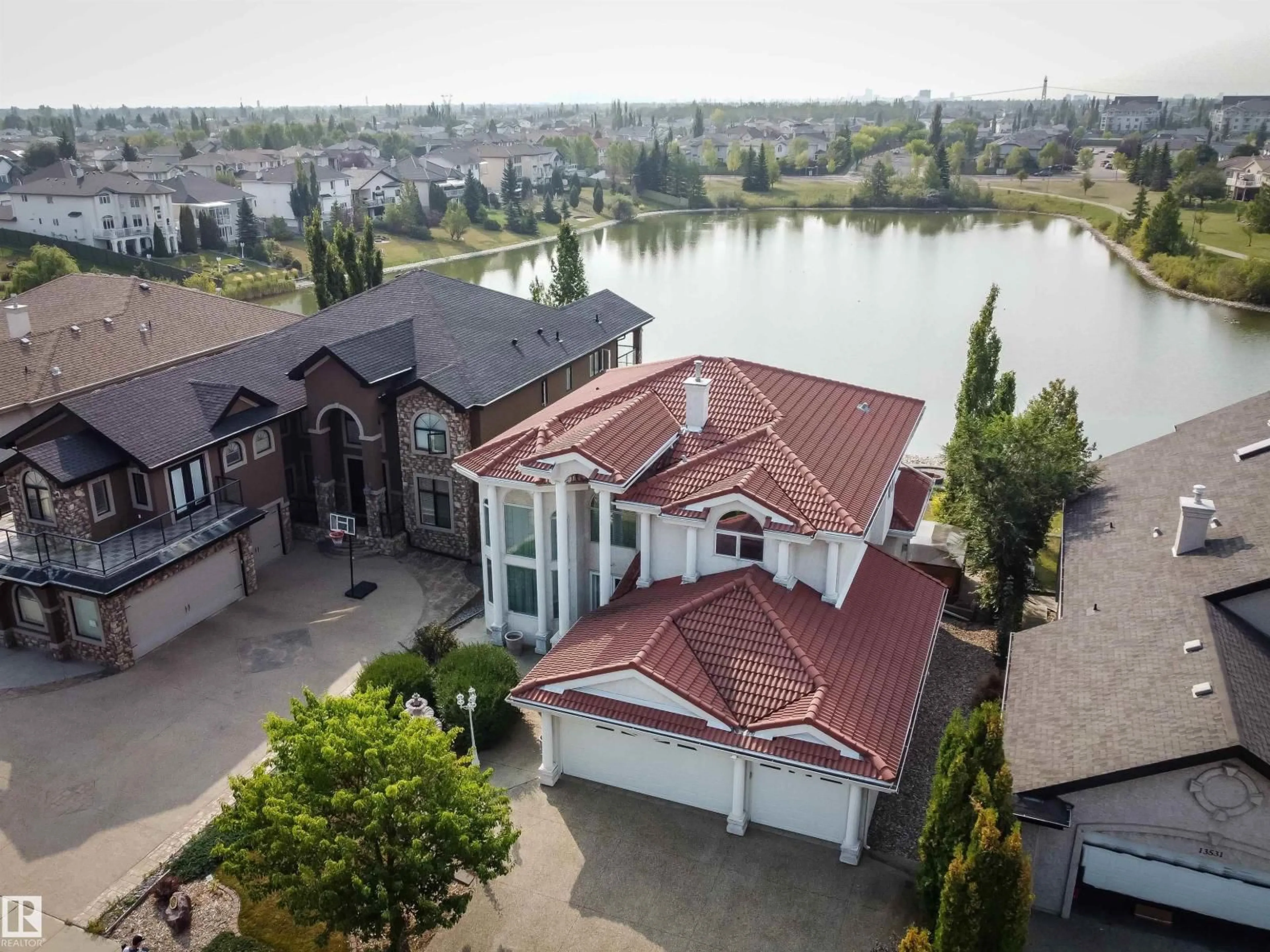 A pic from outside/outdoor area/front of a property/back of a property/a pic from drone, water/lake/river/ocean view for NW - 13527 158 AV, Edmonton Alberta T6V1S3