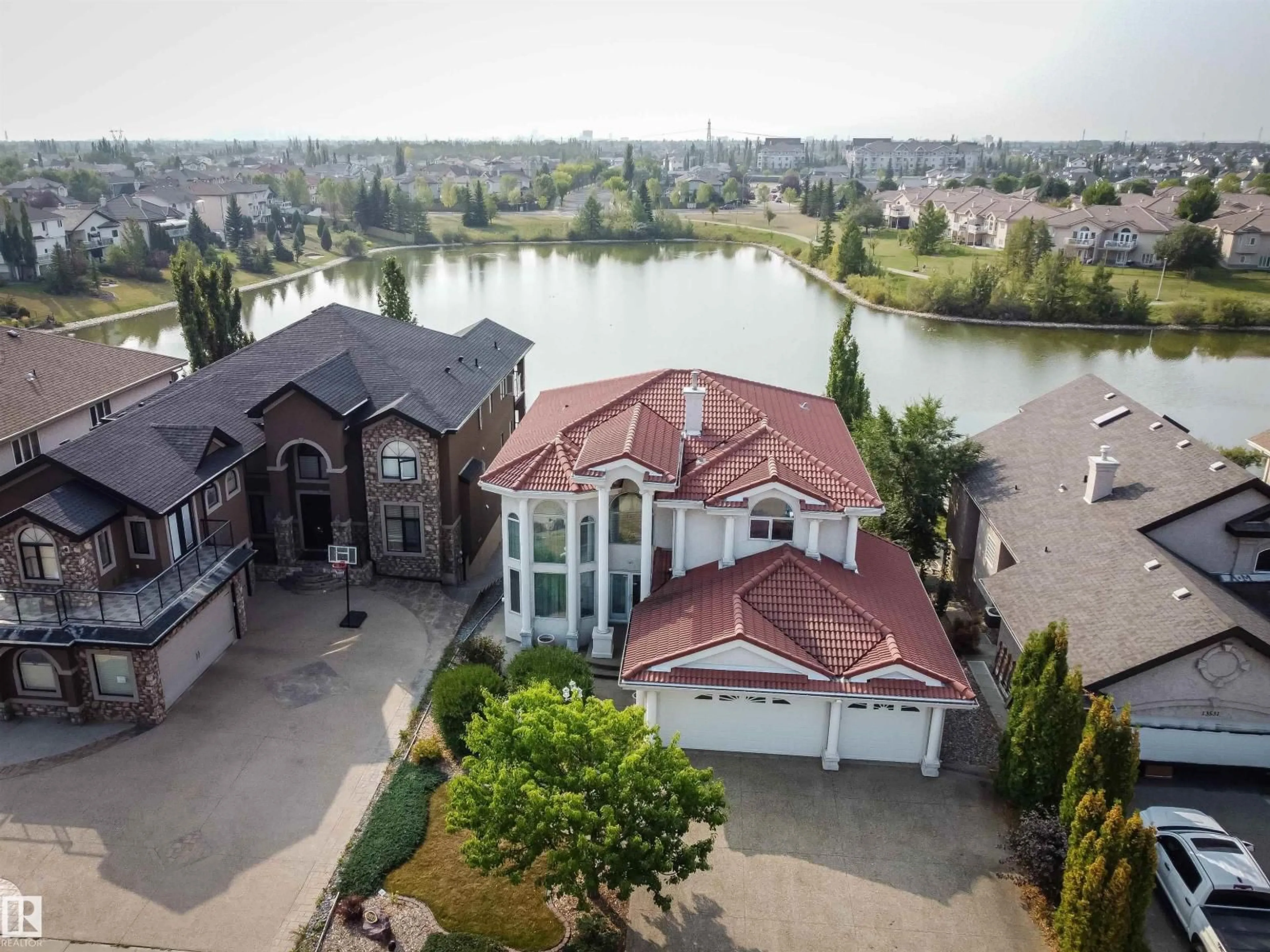 A pic from outside/outdoor area/front of a property/back of a property/a pic from drone, water/lake/river/ocean view for NW - 13527 158 AV, Edmonton Alberta T6V1S3