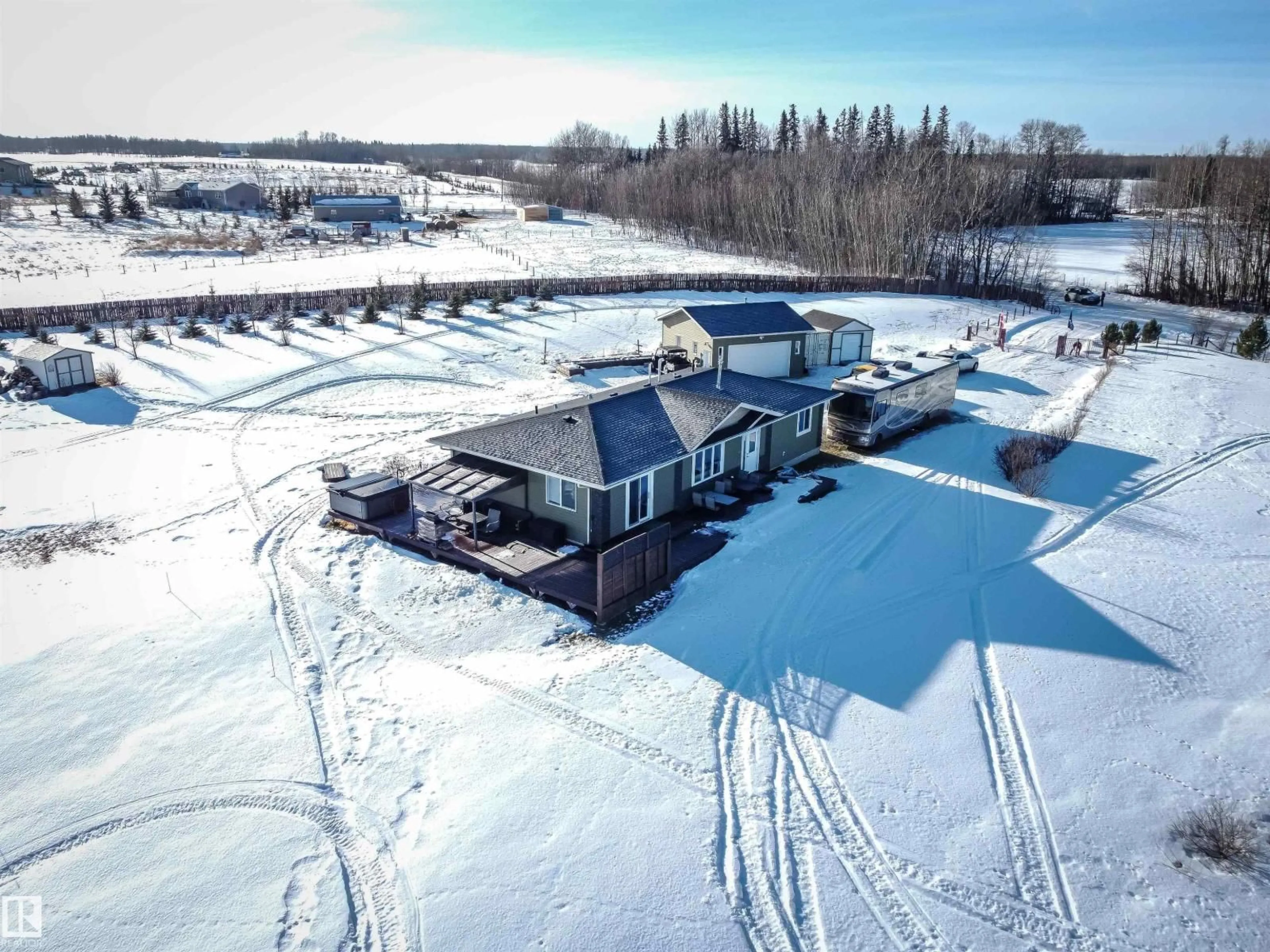 A pic from outside/outdoor area/front of a property/back of a property/a pic from drone, unknown for 54101 RGE ROAD 35, Rural Lac Ste. Anne County Alberta T0E0A0