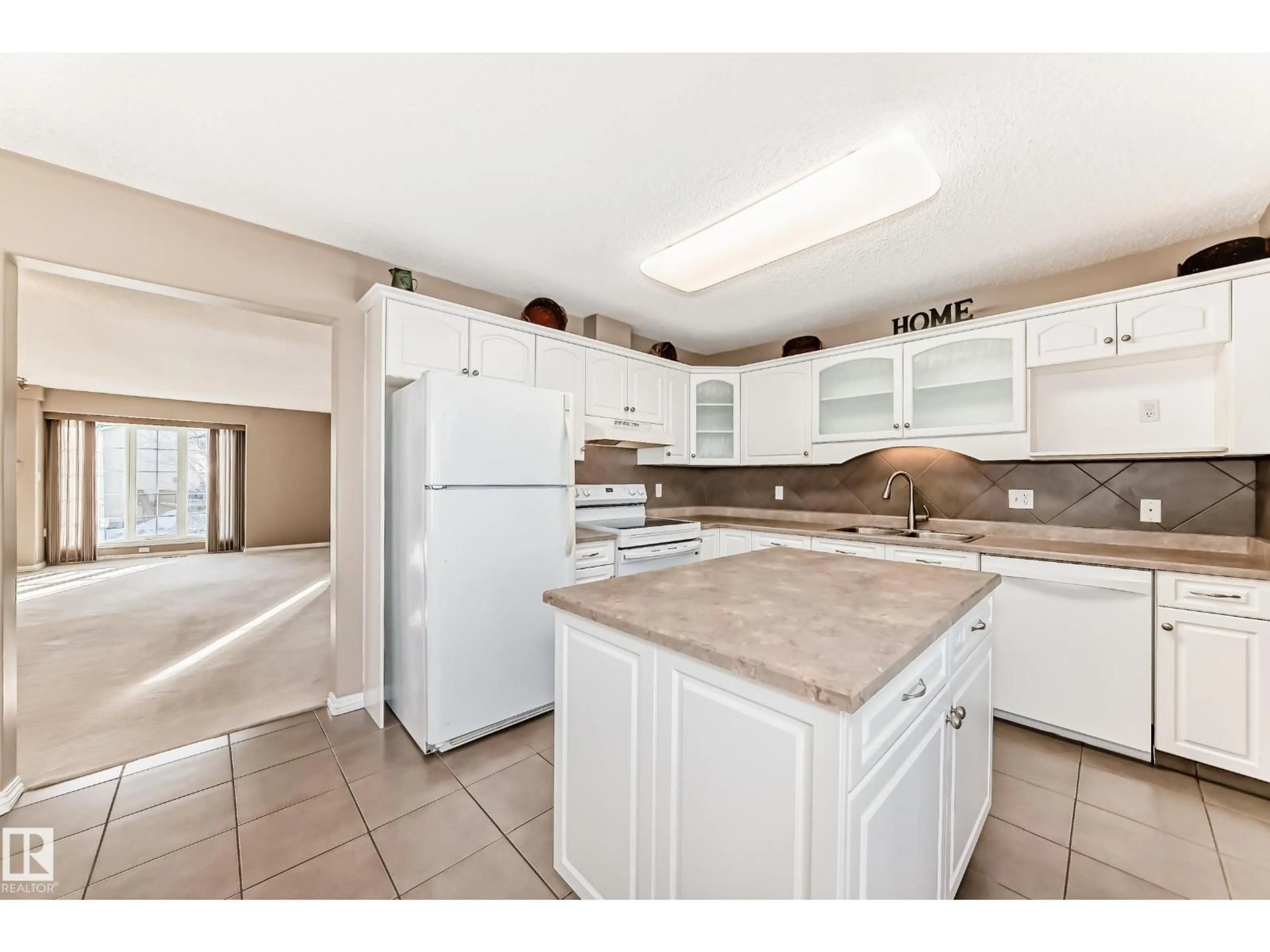 Standard kitchen, ceramic/tile floor for #4 - 2419 133 AV, Edmonton Alberta T5A5A5