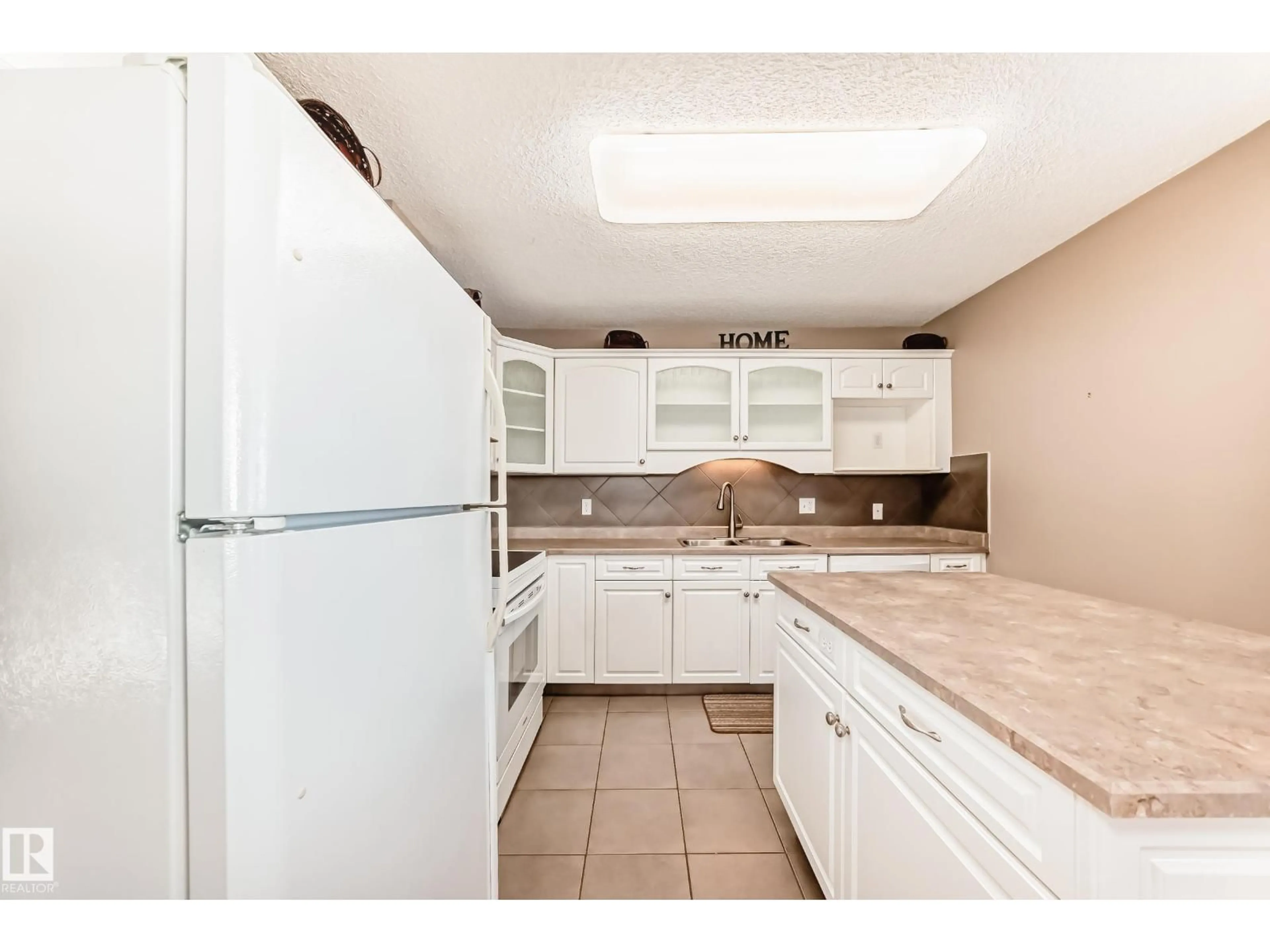 Standard kitchen, ceramic/tile floor for #4 - 2419 133 AV, Edmonton Alberta T5A5A5