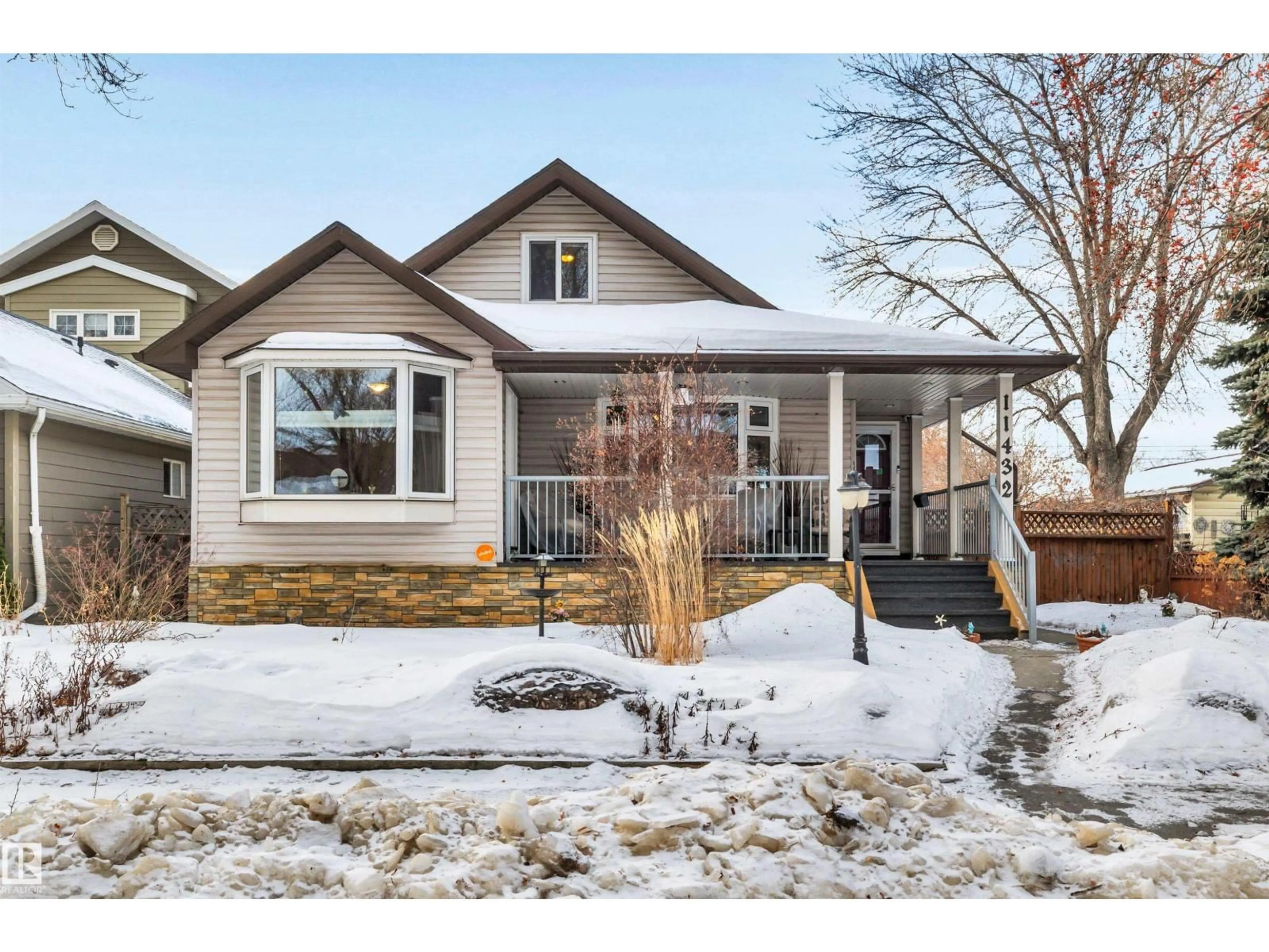 Home with brick exterior material, street for 11432 71 ST, Edmonton Alberta T5B1V7