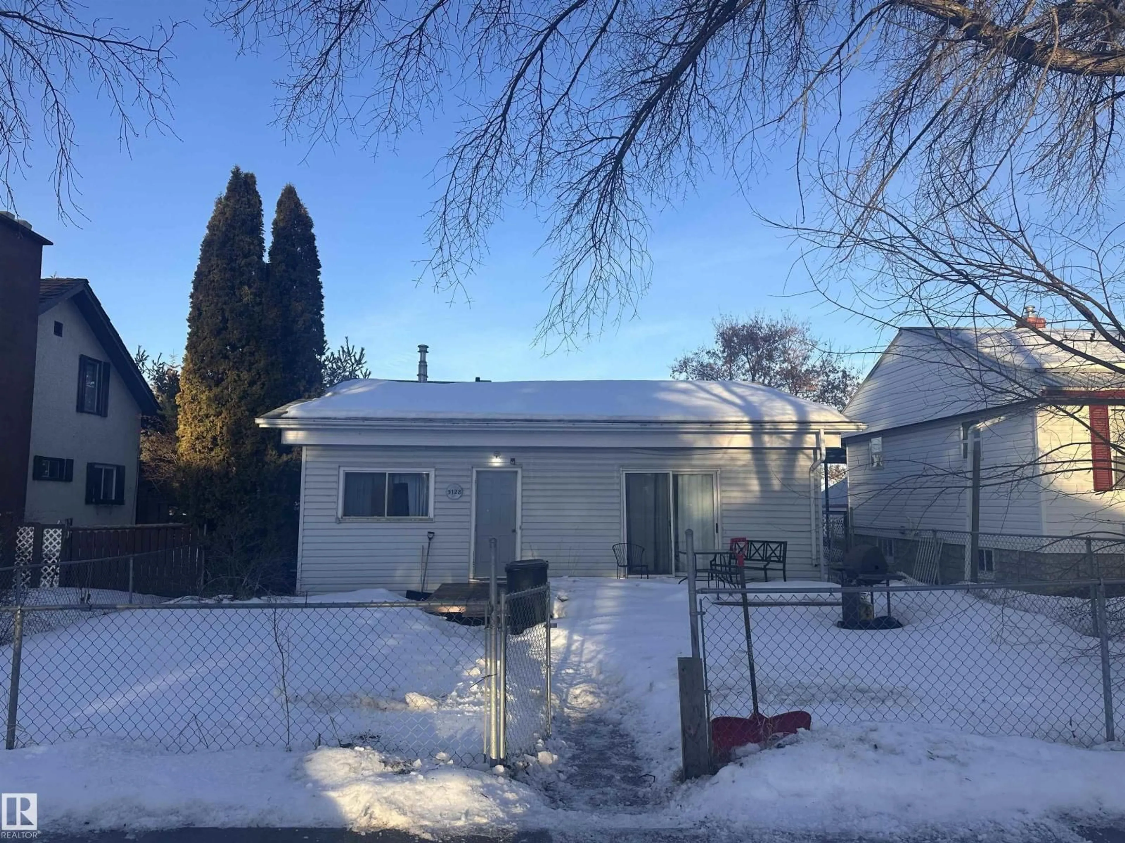 A pic from outside/outdoor area/front of a property/back of a property/a pic from drone, street for 5128 52, Barrhead Alberta T7N1E9