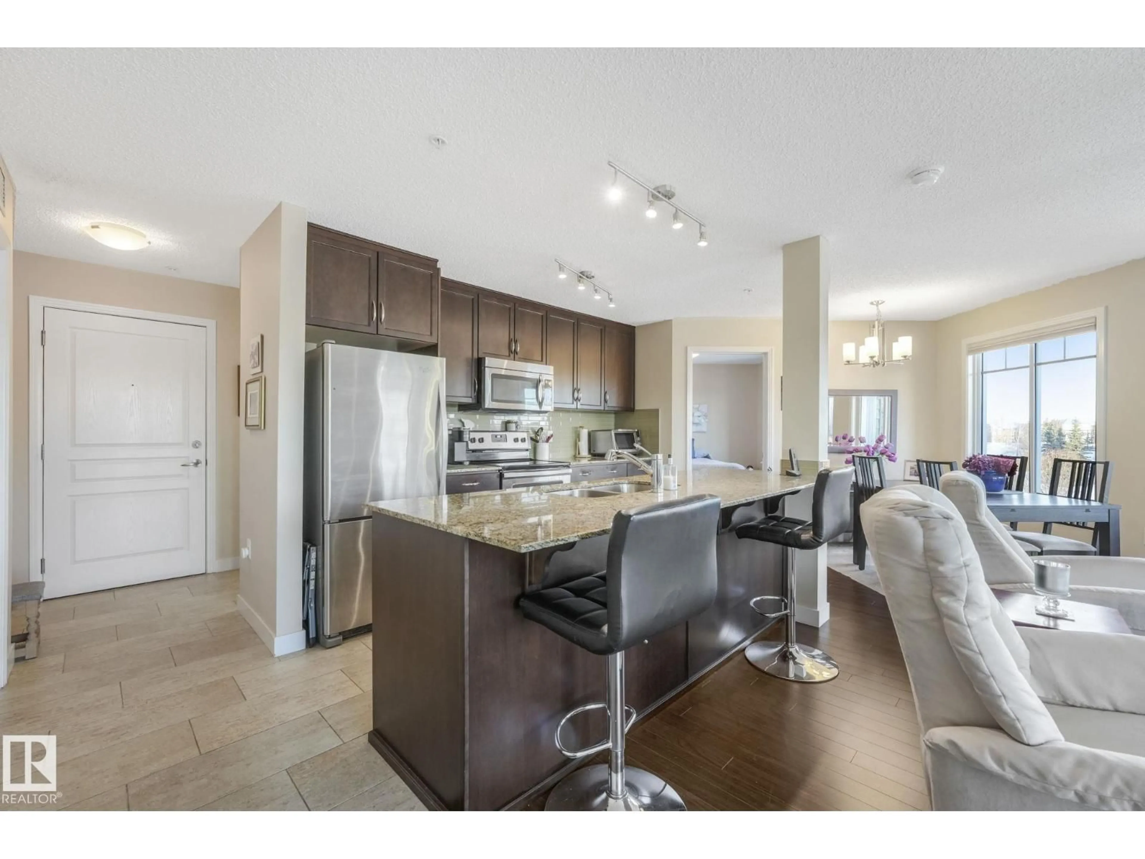 Open concept kitchen, unknown for #215 - 7021 SOUTH TERWILLEGAR DR, Edmonton Alberta T6R0W5
