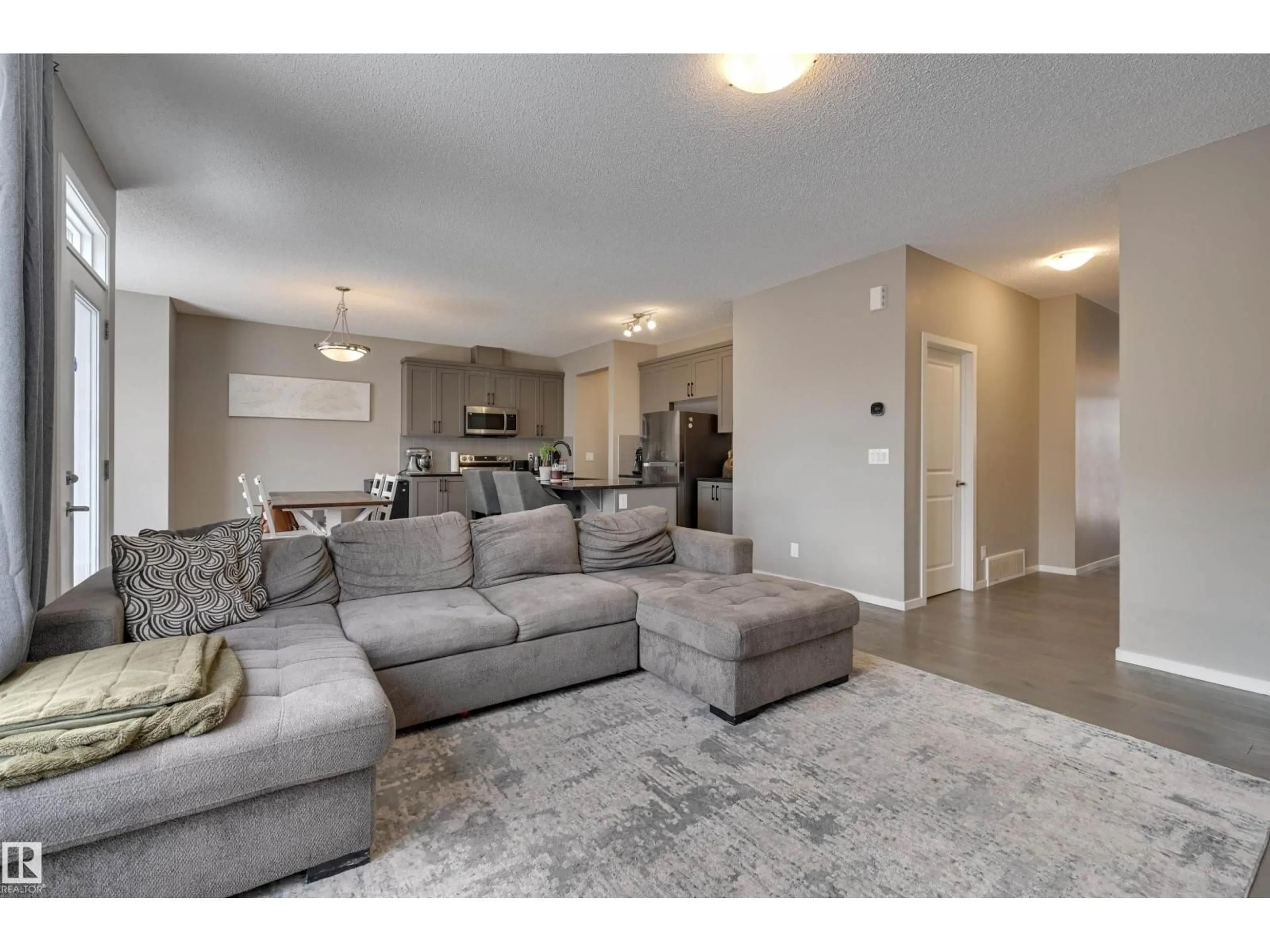 Living room with furniture, unknown for 2031 207 ST, Edmonton Alberta T6M1R7