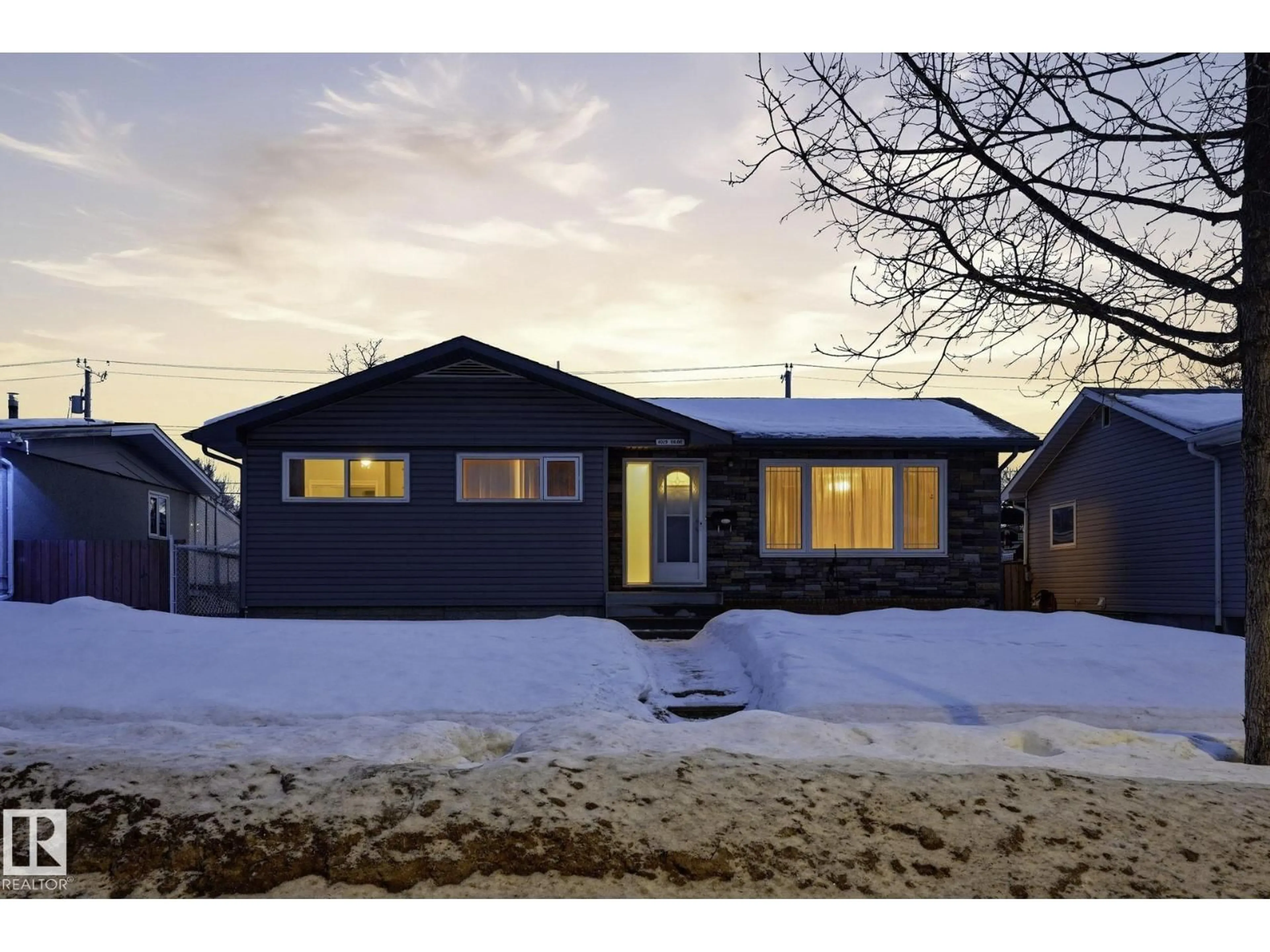Home with vinyl exterior material, street for 4029 114 AV, Edmonton Alberta T5W0S9