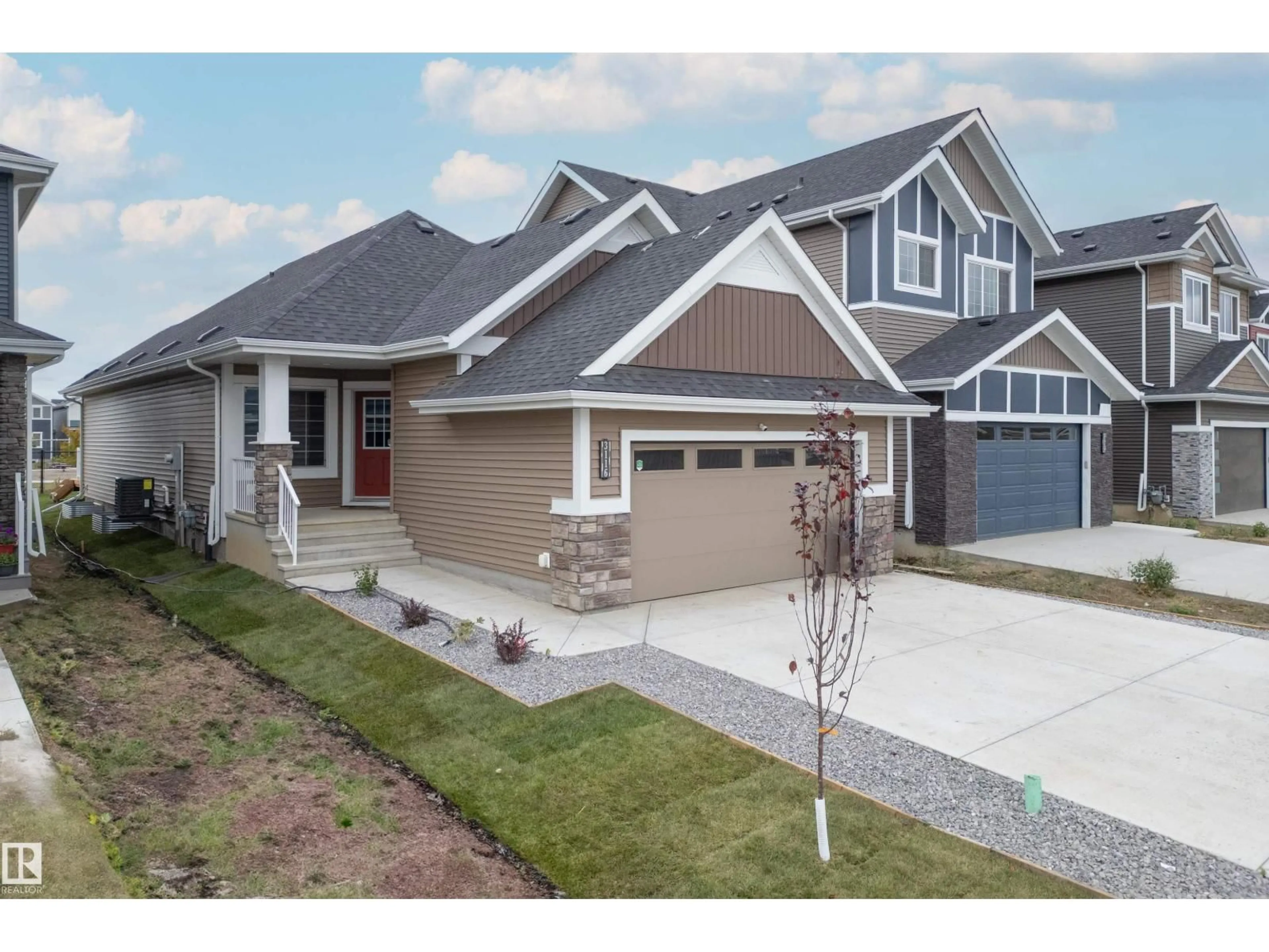 Home with vinyl exterior material, street for 3116 167 ST, Edmonton Alberta T6W4R2