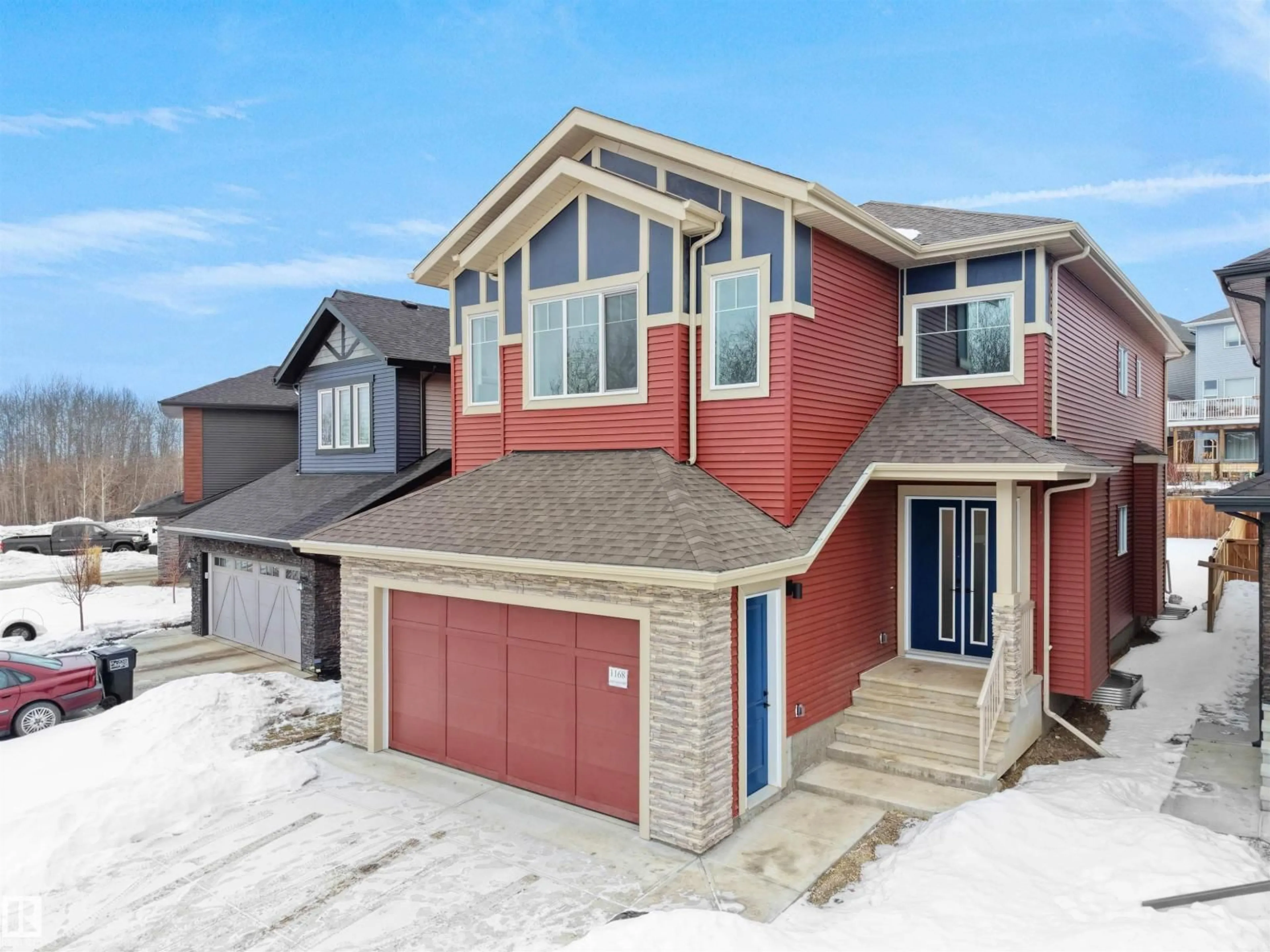 Home with brick exterior material, street for 1168 GYRFALCON CR, Edmonton Alberta T5S0S1