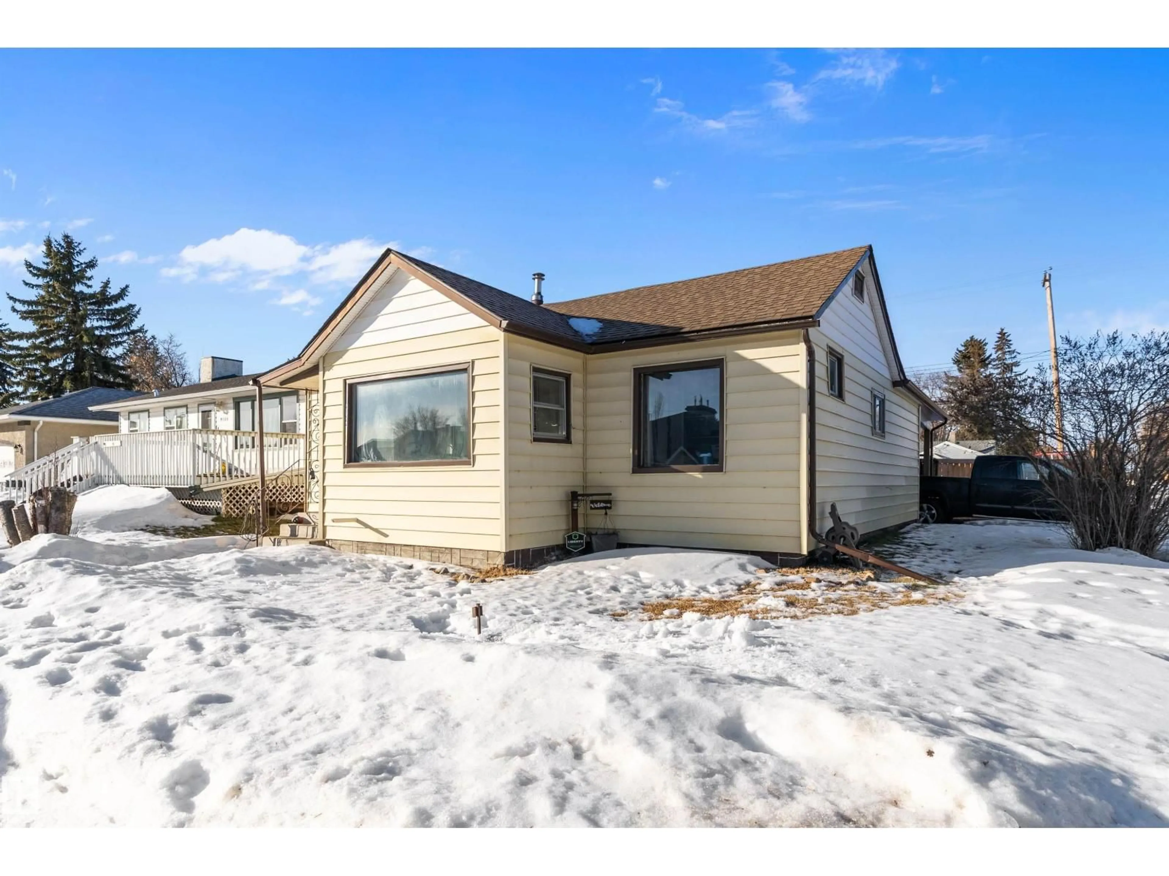 Home with vinyl exterior material, street for 4124 53 ST, Wetaskiwin Alberta T9A1P8