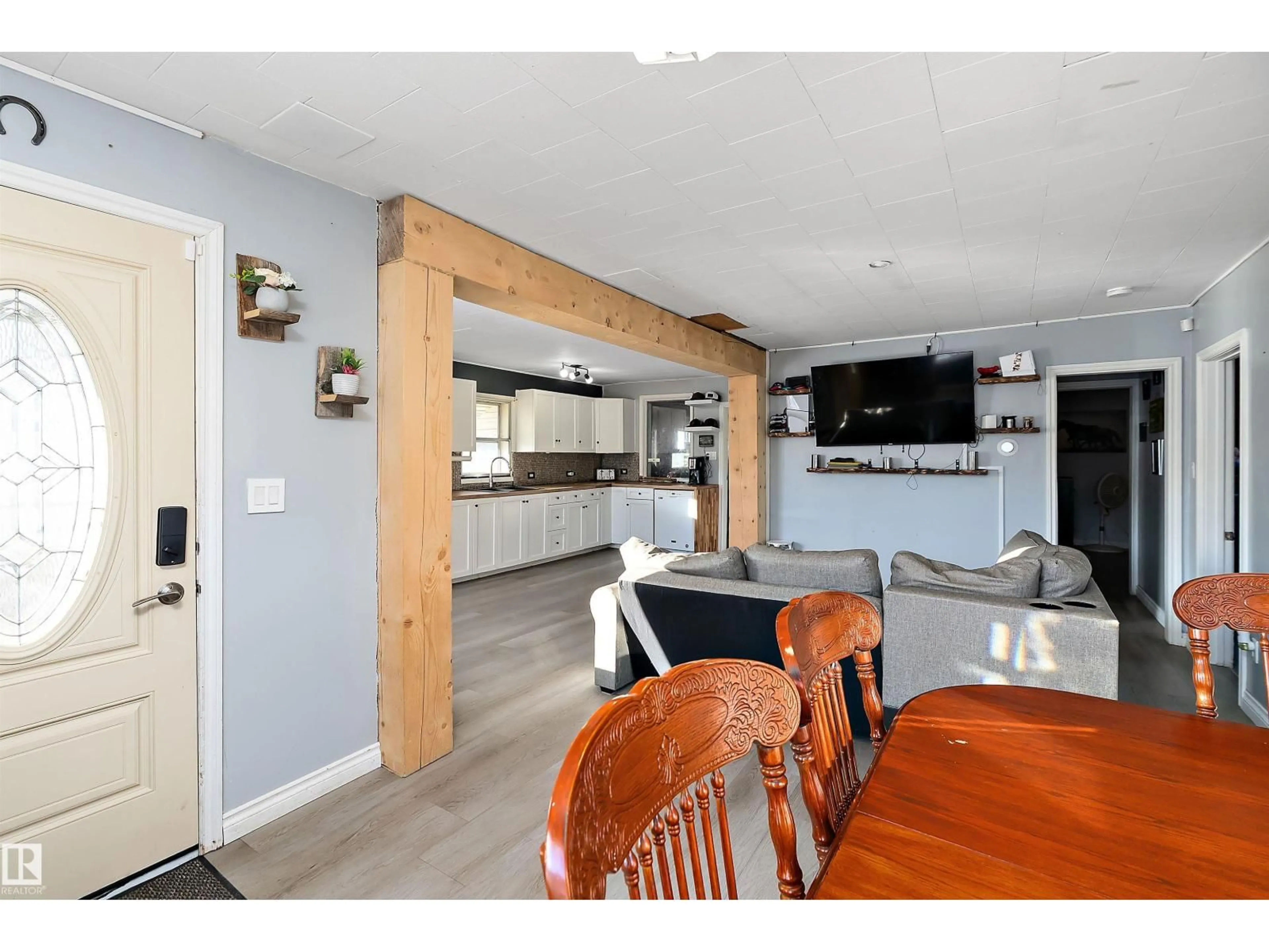 Open concept kitchen, wood/laminate floor for 4124 53 ST, Wetaskiwin Alberta T9A1P8