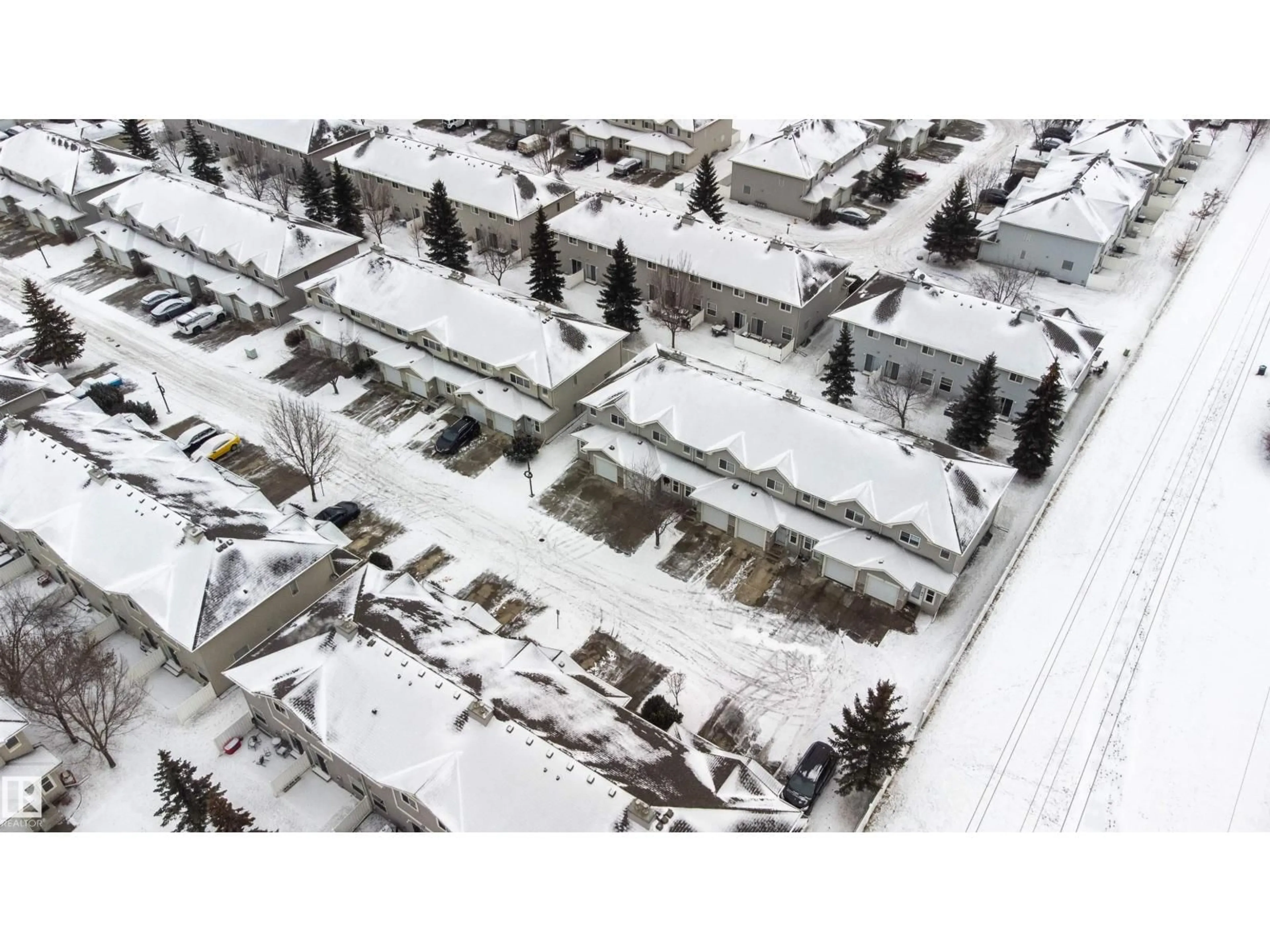 A pic from outside/outdoor area/front of a property/back of a property/a pic from drone, street for #111 - 230 EDWARDS DR, Edmonton Alberta T6X1G7