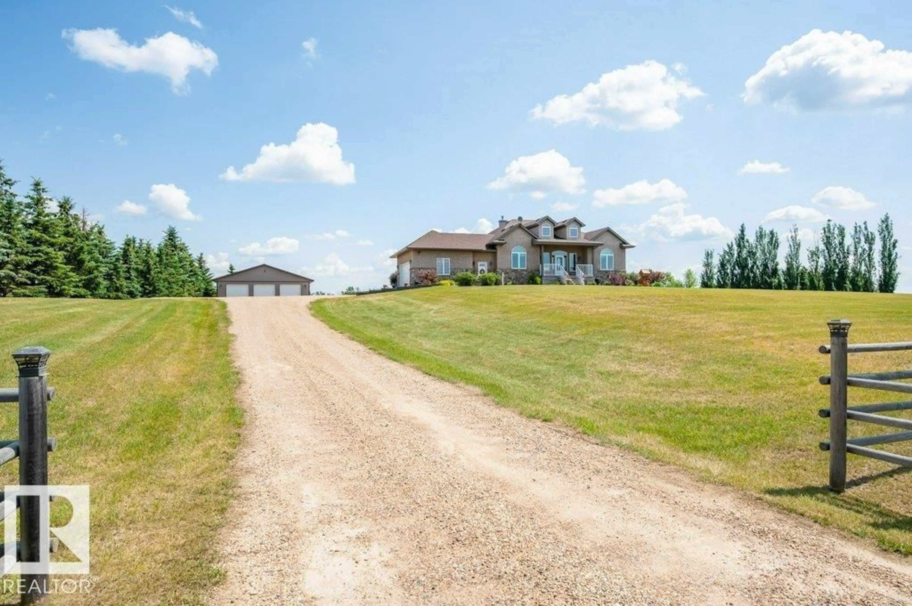 A pic from outside/outdoor area/front of a property/back of a property/a pic from drone, street for 56203 RGE ROAD 230, Rural Sturgeon County Alberta T0A1N0