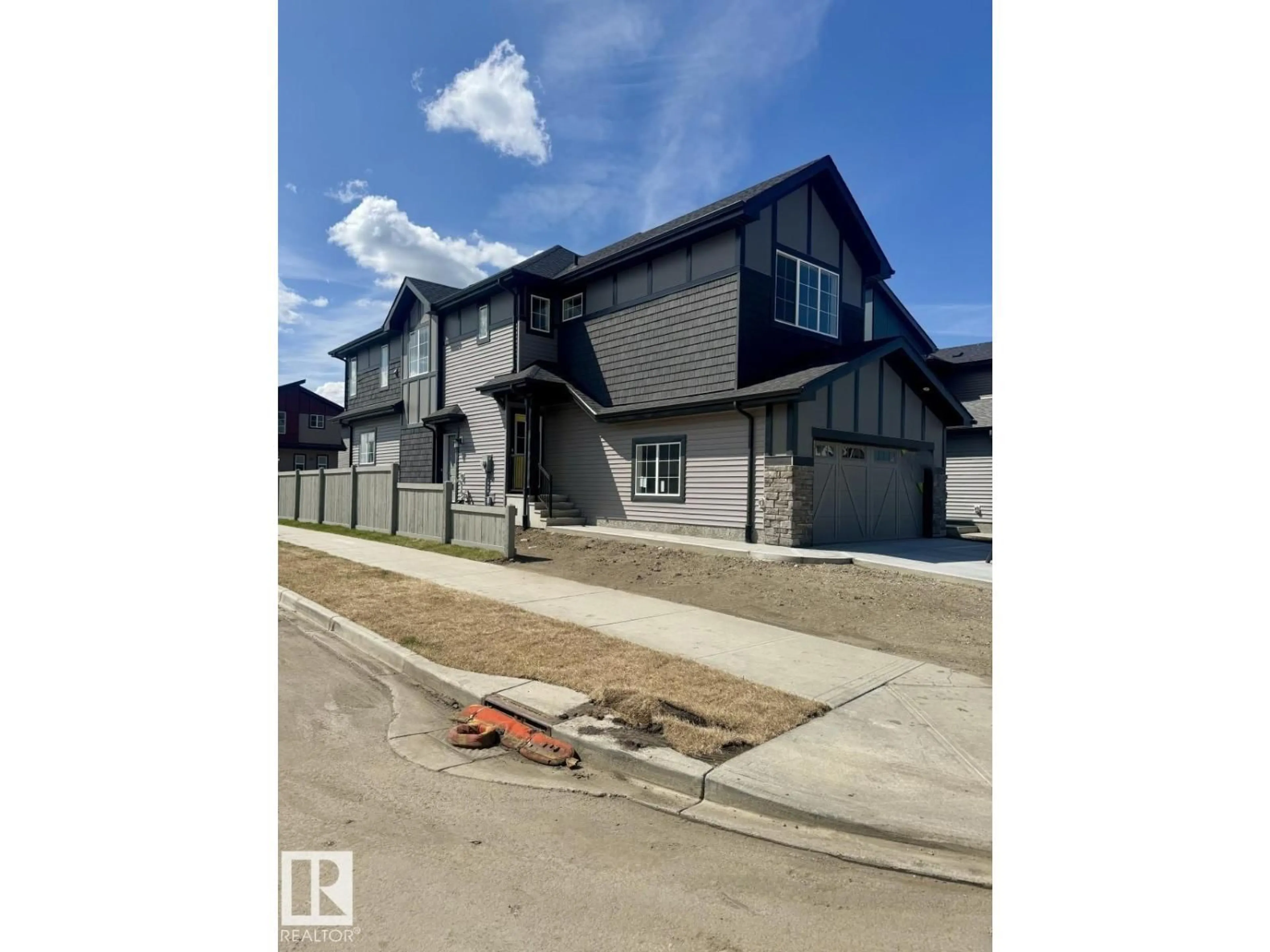 A pic from outside/outdoor area/front of a property/back of a property/a pic from drone, street for 17408 2 ST, Edmonton Alberta T5Y4G6