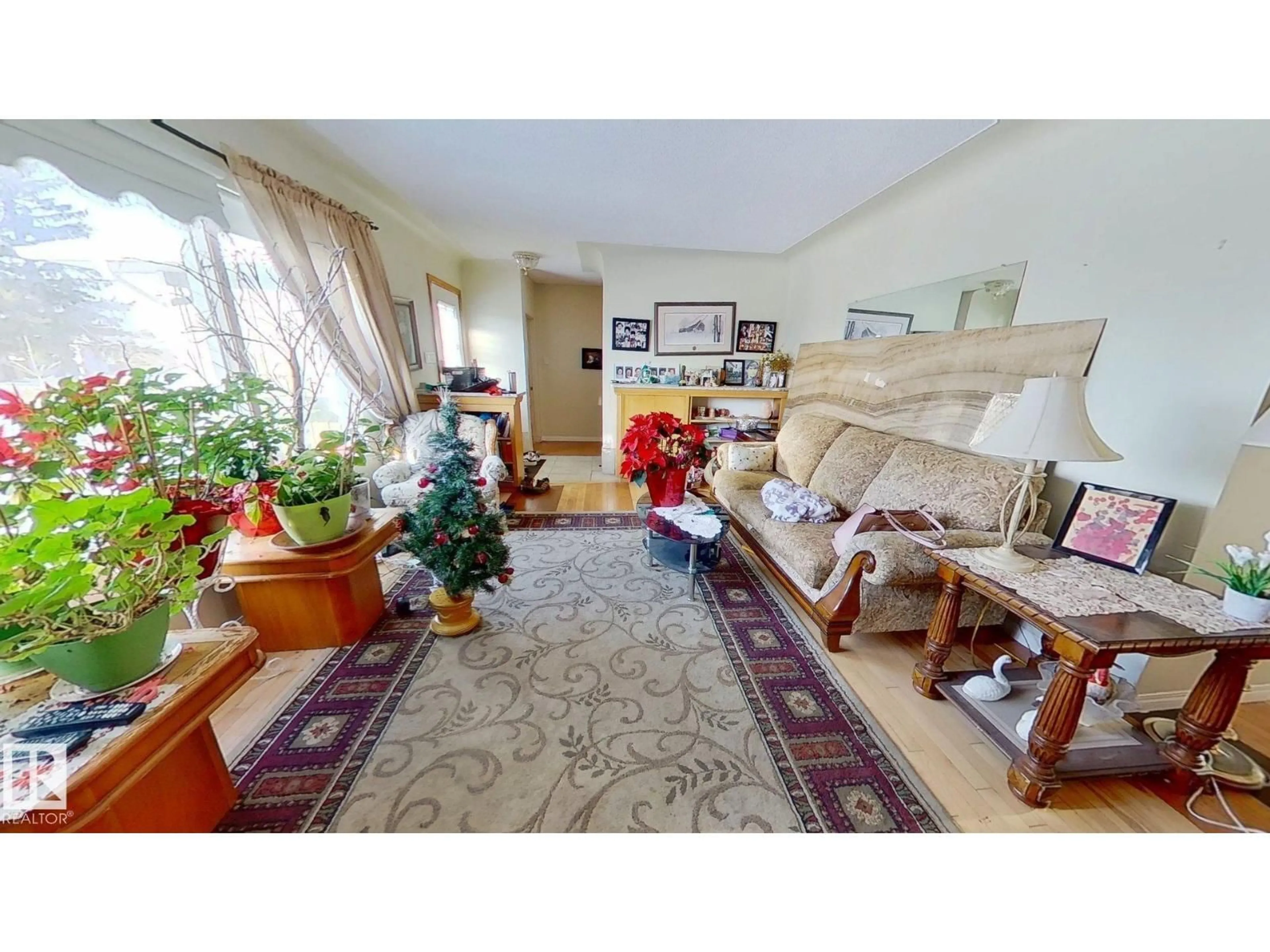 Living room with furniture, unknown for 9216 130 AV, Edmonton Alberta T5E0S2