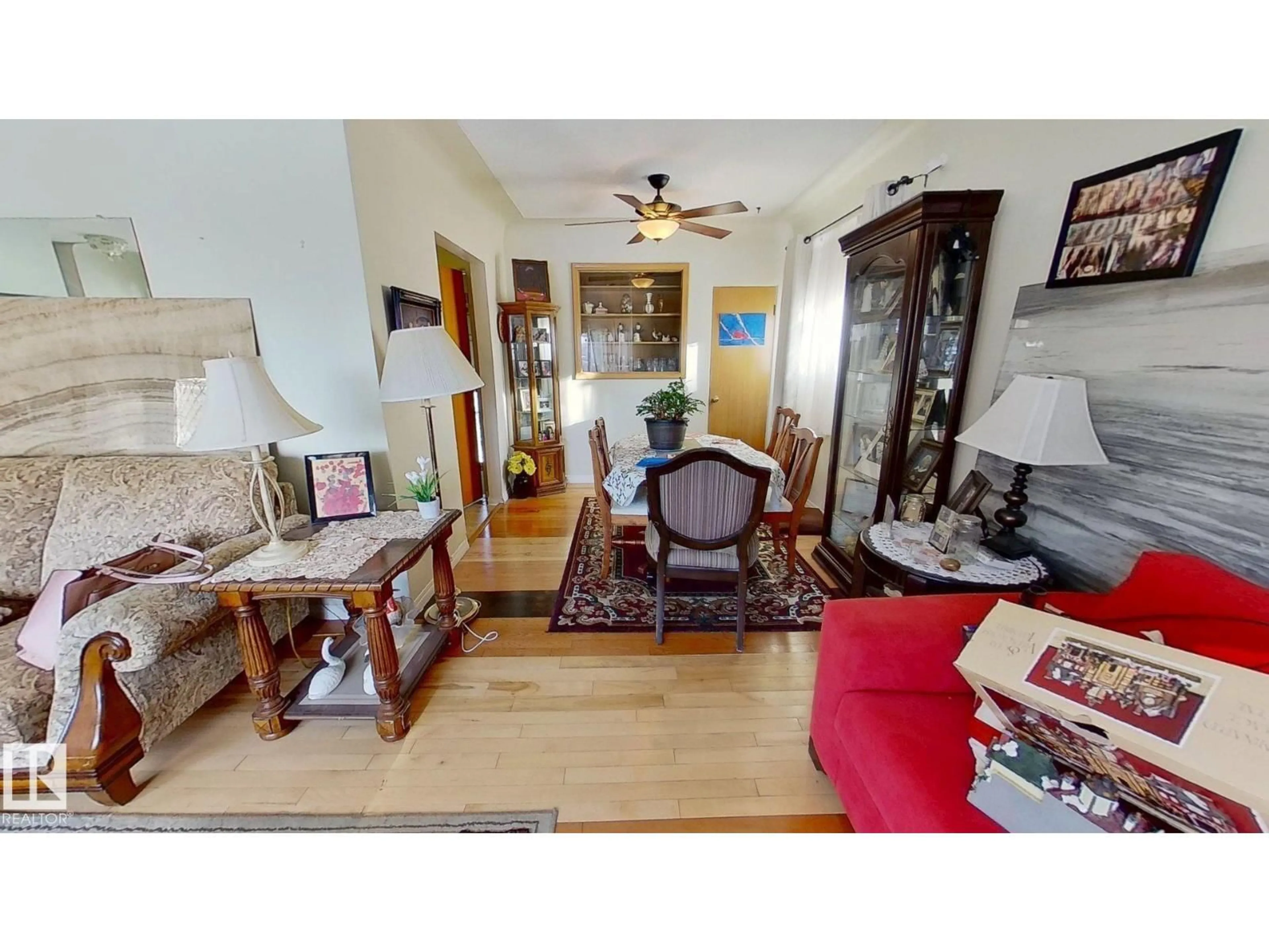 Living room with furniture, wood/laminate floor for 9216 130 AV, Edmonton Alberta T5E0S2