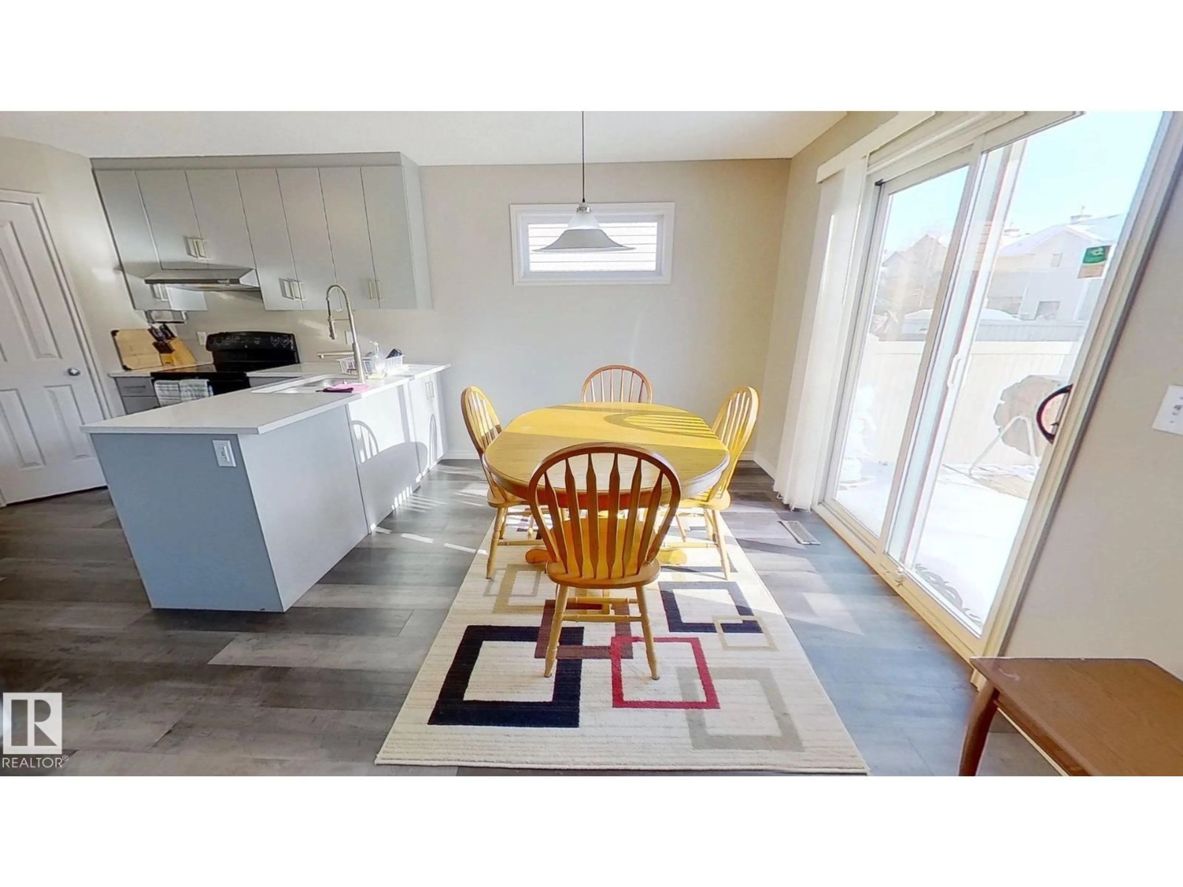 Open concept kitchen, ceramic/tile floor for 3811 MCLEAN CL, Edmonton Alberta T6W1R4
