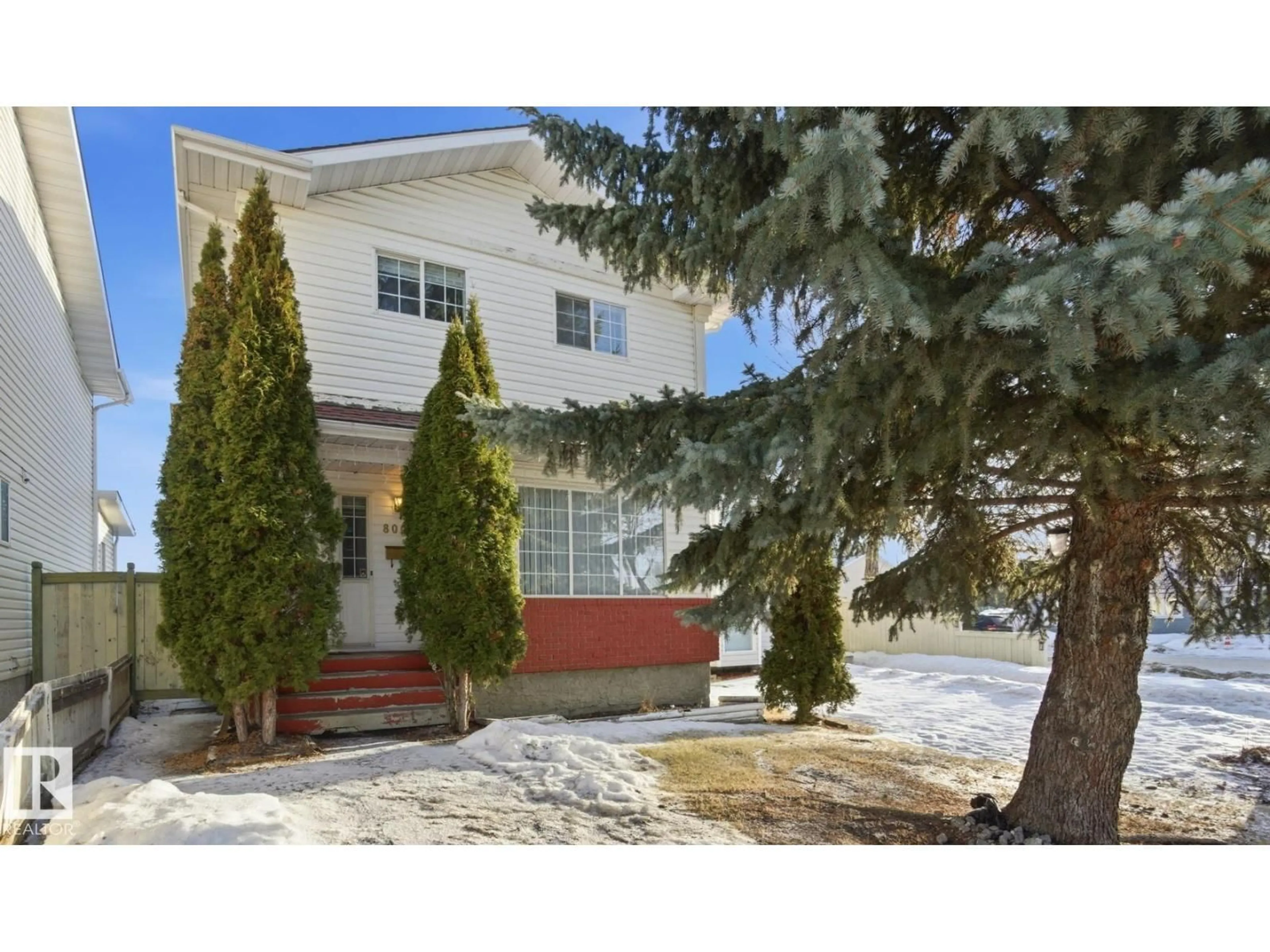 Home with vinyl exterior material, street for 8006 15A AV, Edmonton Alberta T6K4E3