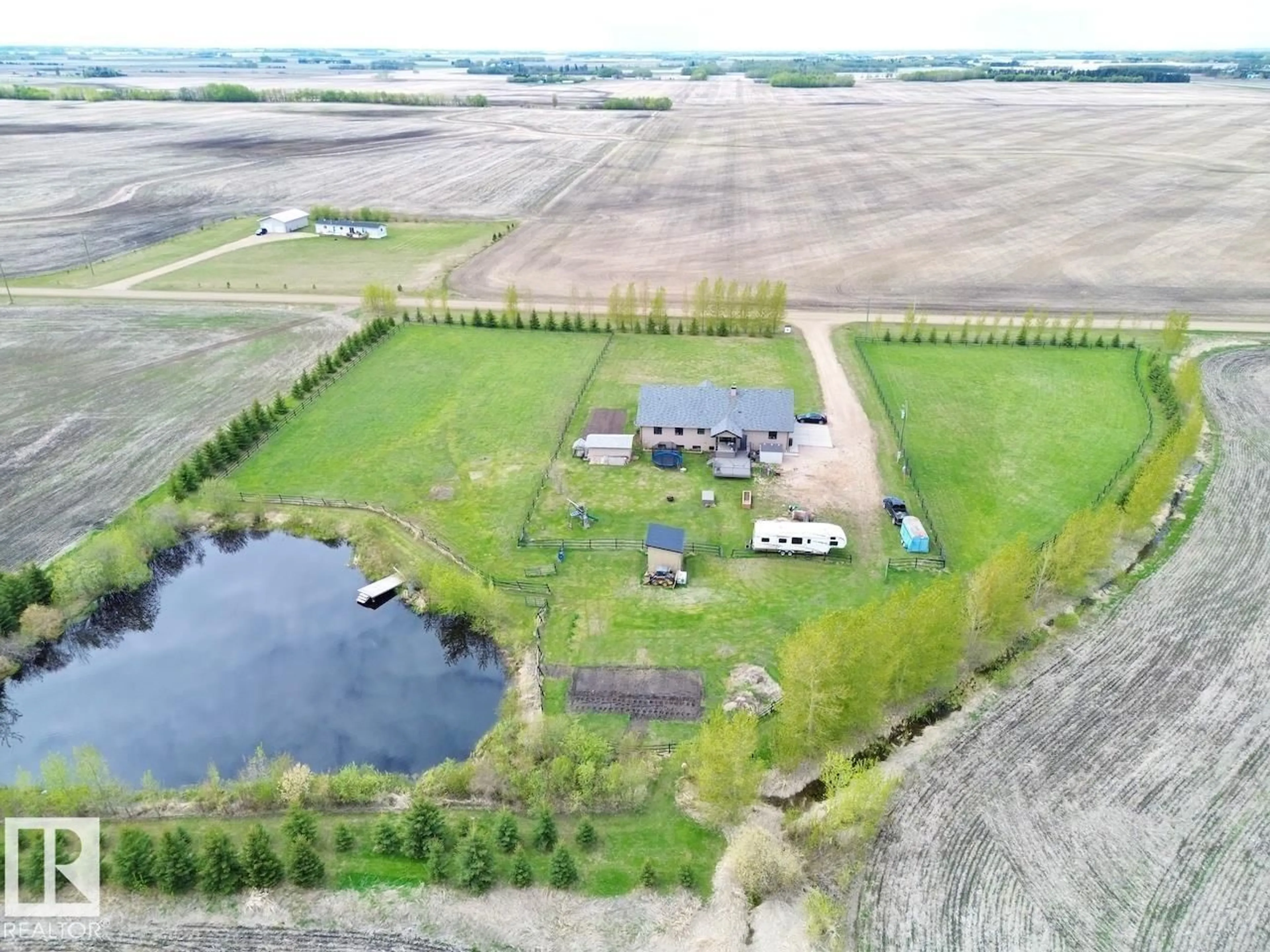A pic from outside/outdoor area/front of a property/back of a property/a pic from drone, water/lake/river/ocean view for 57317 RANGE ROAD 254, Rural Sturgeon County Alberta T0G1L0