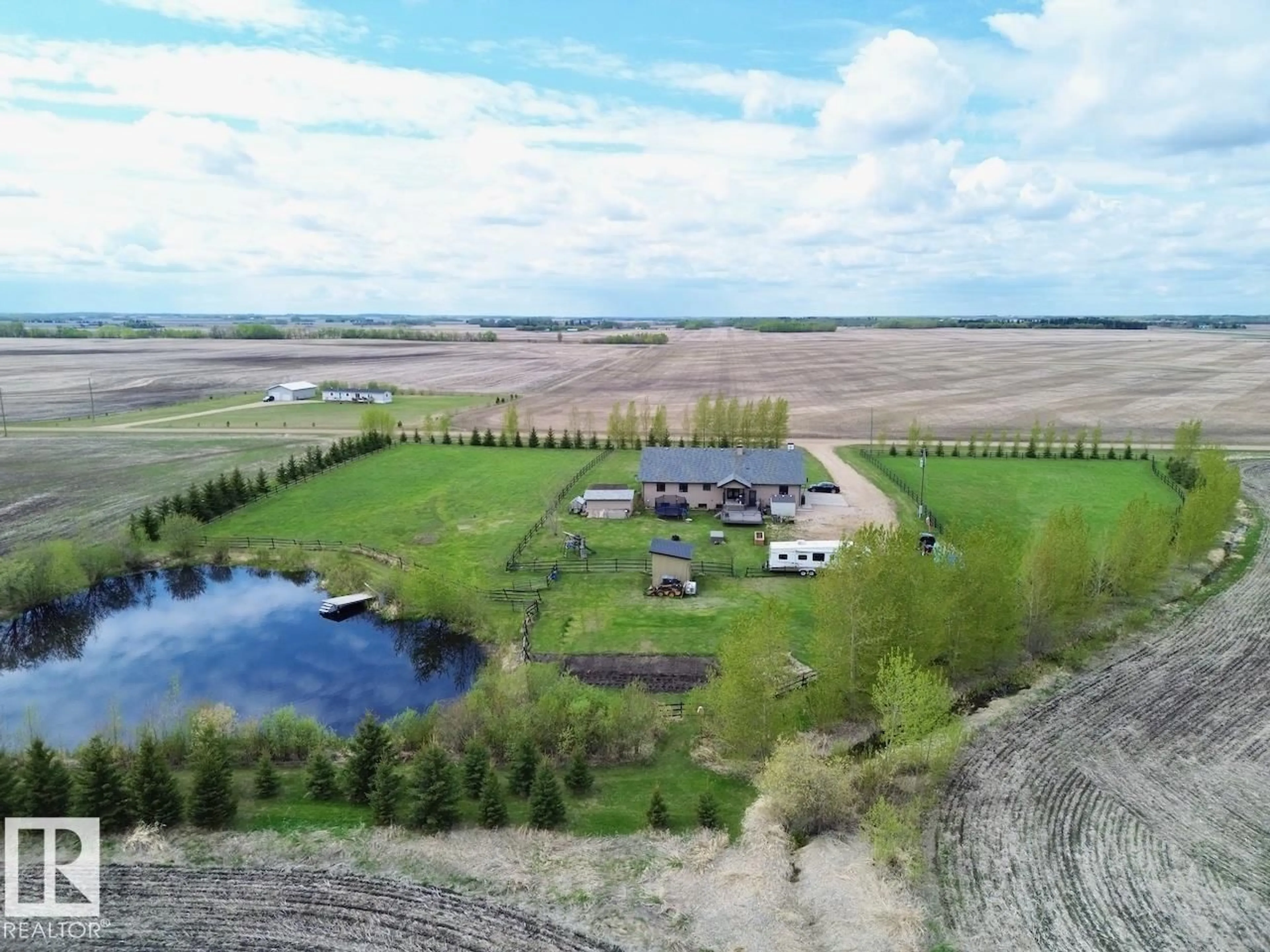 A pic from outside/outdoor area/front of a property/back of a property/a pic from drone, water/lake/river/ocean view for 57317 RANGE ROAD 254, Rural Sturgeon County Alberta T0G1L0