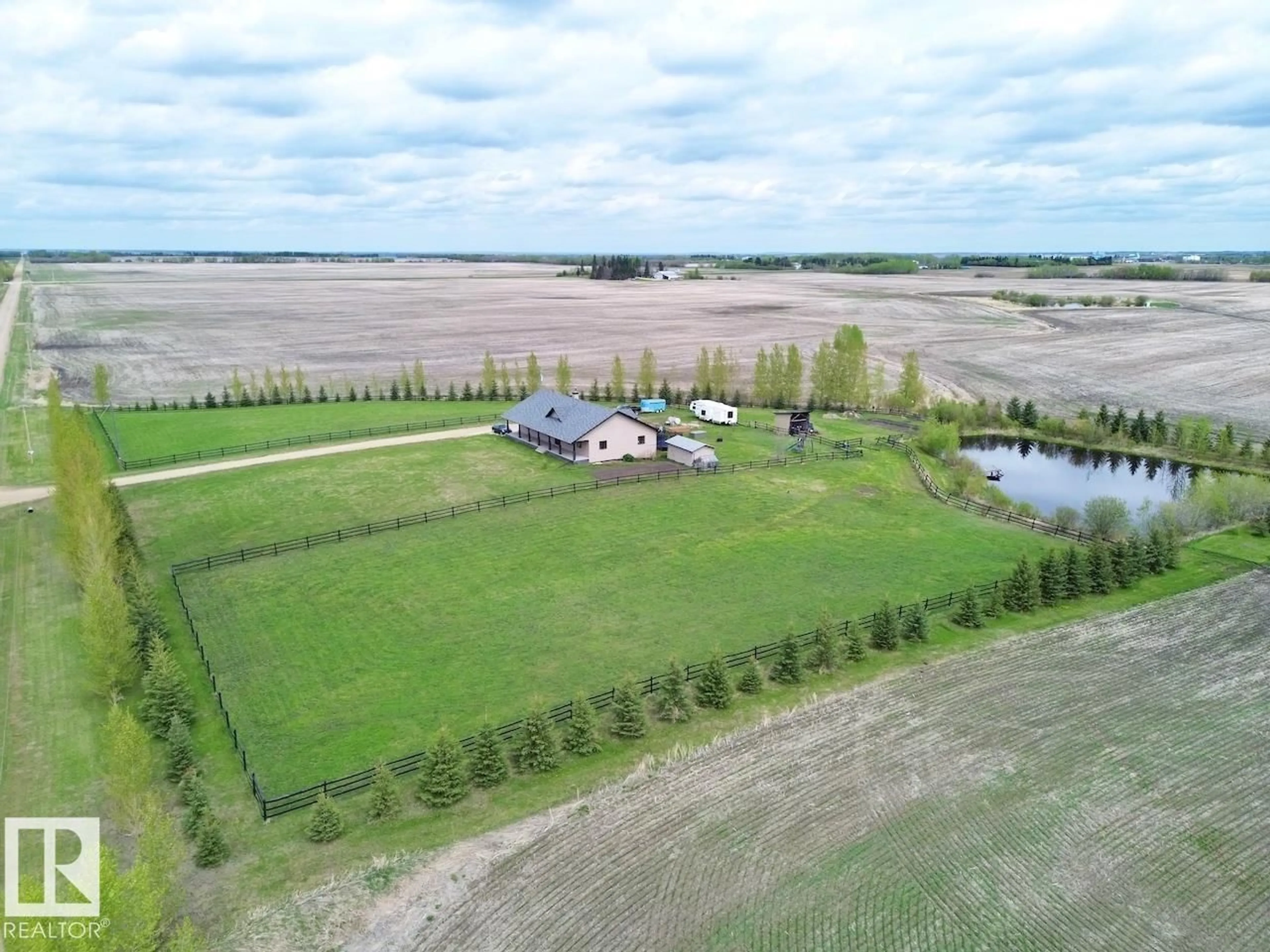 A pic from outside/outdoor area/front of a property/back of a property/a pic from drone, water/lake/river/ocean view for 57317 RANGE ROAD 254, Rural Sturgeon County Alberta T0G1L0