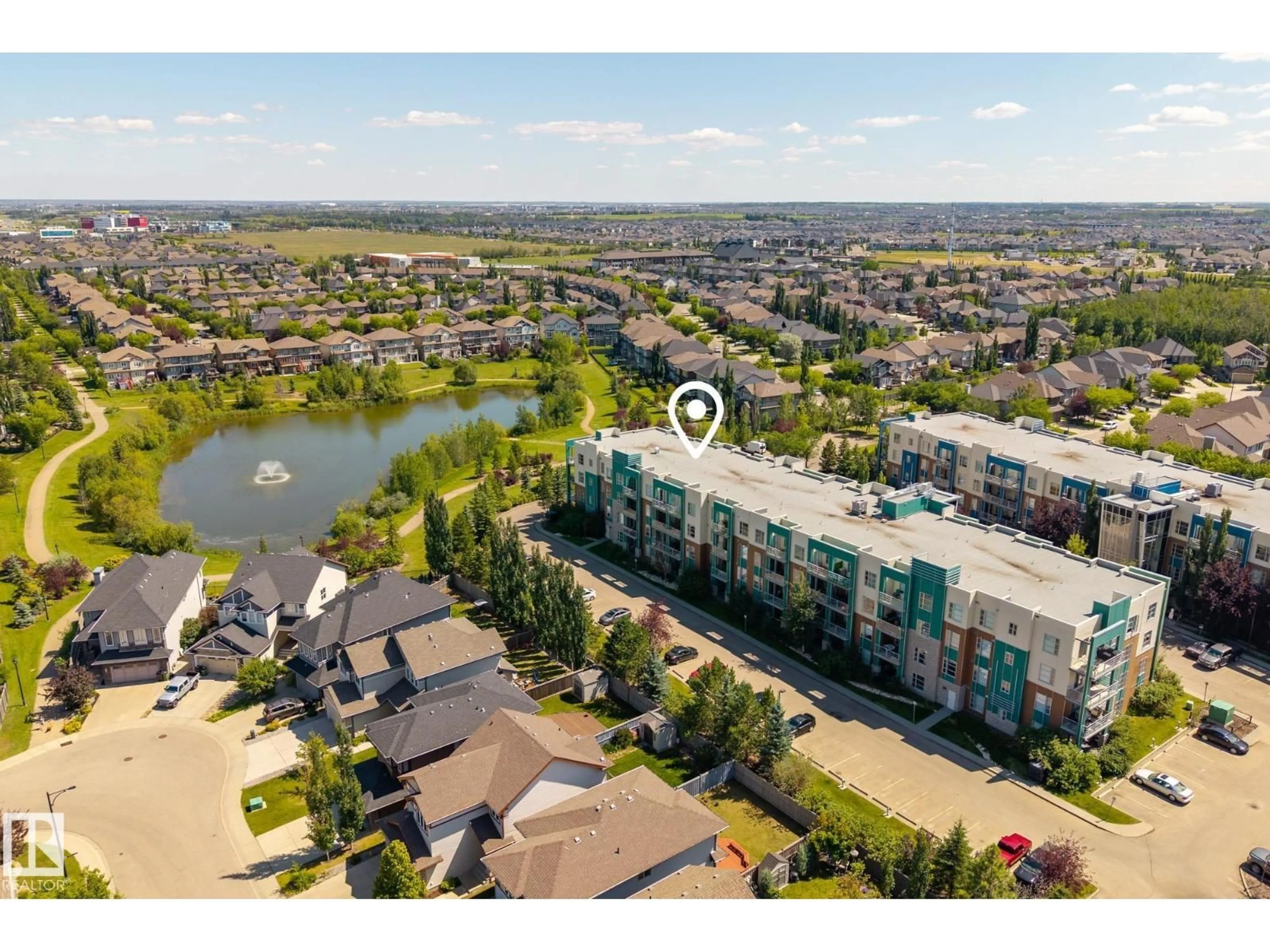 A pic from outside/outdoor area/front of a property/back of a property/a pic from drone, water/lake/river/ocean view for #204 - 2588 ANDERSON WY, Edmonton Alberta T6W0R2