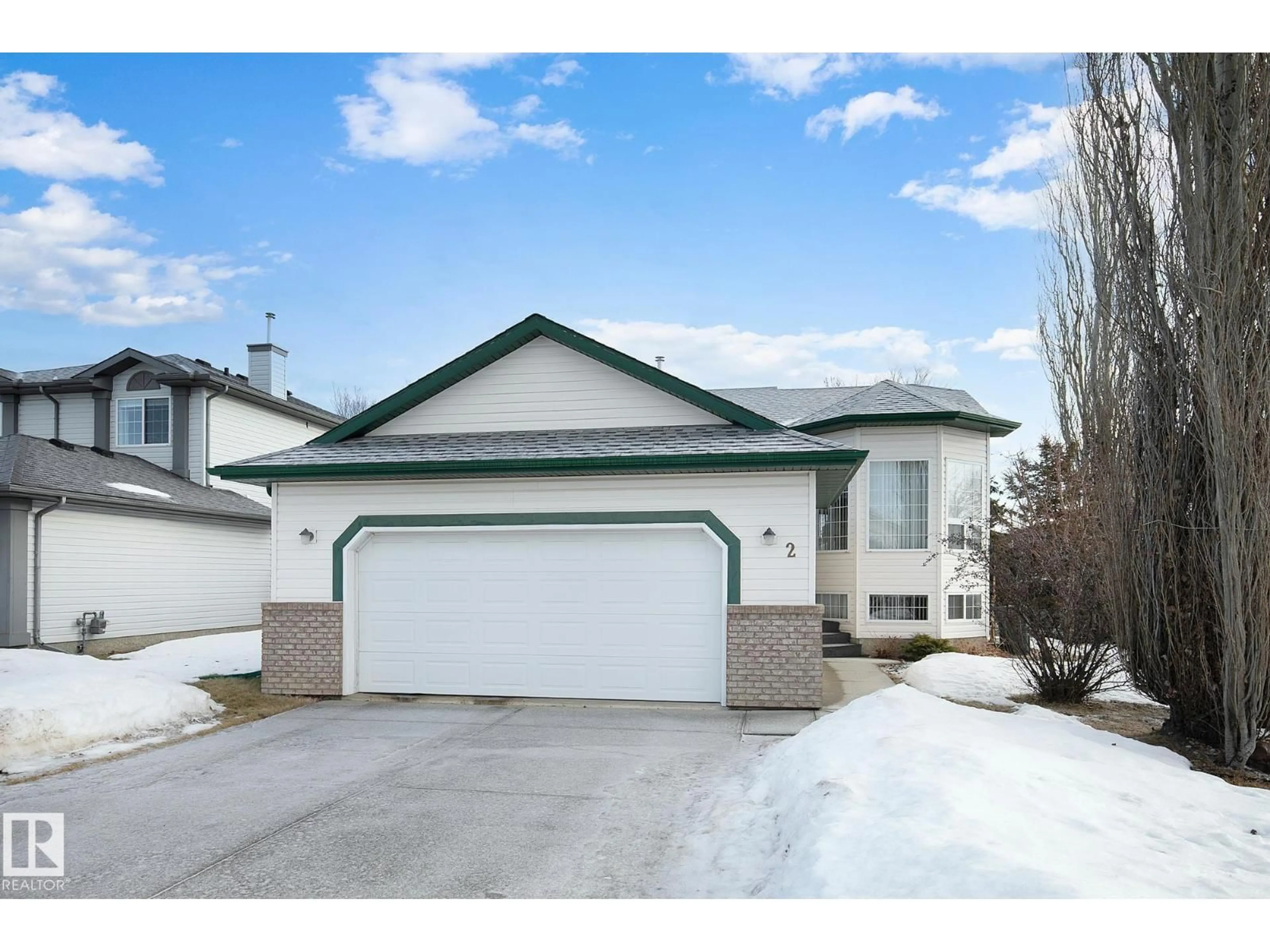 Home with vinyl exterior material, street for 2 CREEKSIDE WY, Spruce Grove Alberta T7X3Y7