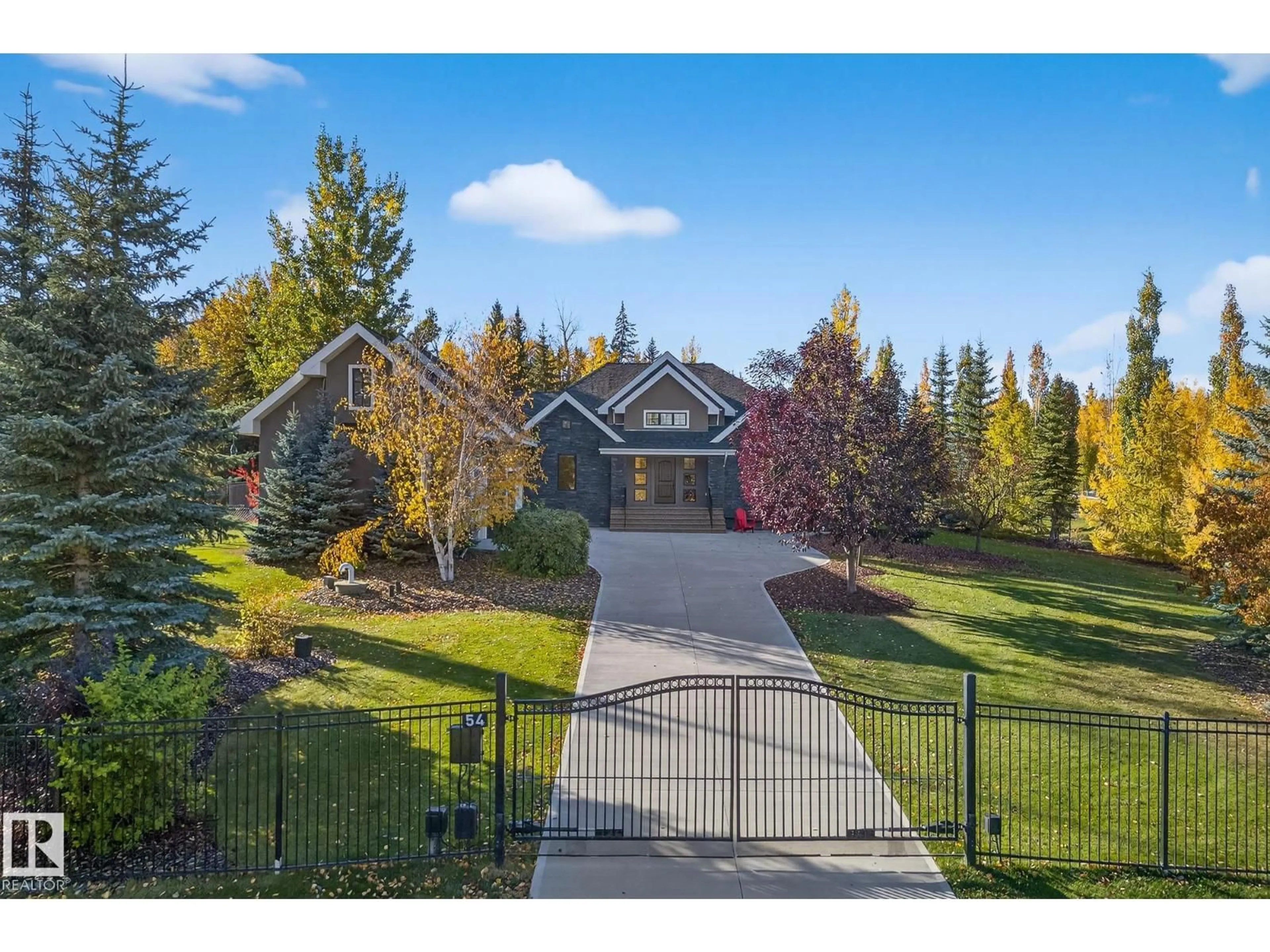 A pic from outside/outdoor area/front of a property/back of a property/a pic from drone, mountain view for 54 53305 RGE ROAD 273, Rural Parkland County Alberta T7X3N3