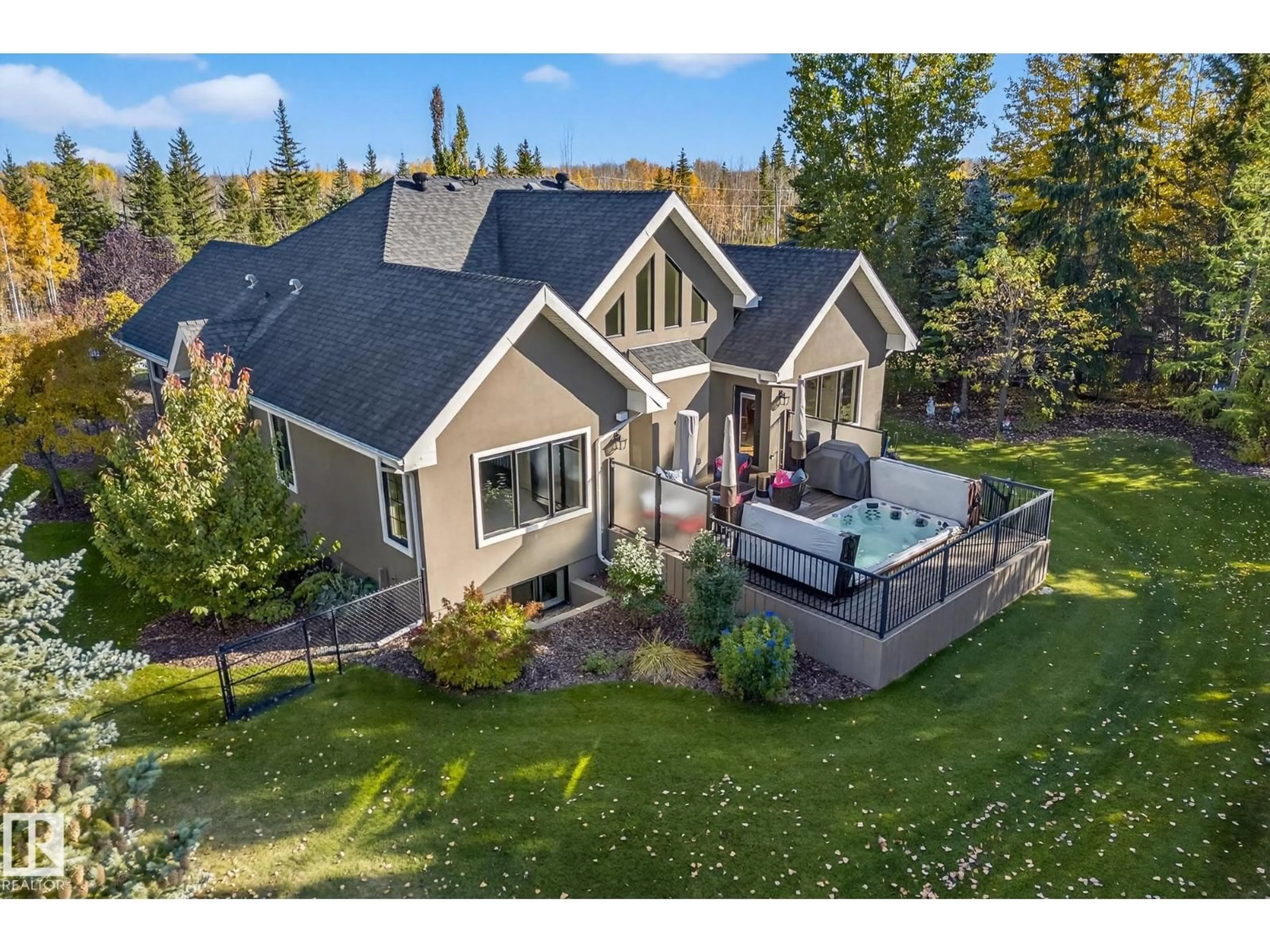 A pic from outside/outdoor area/front of a property/back of a property/a pic from drone, mountain view for 54 53305 RGE ROAD 273, Rural Parkland County Alberta T7X3N3