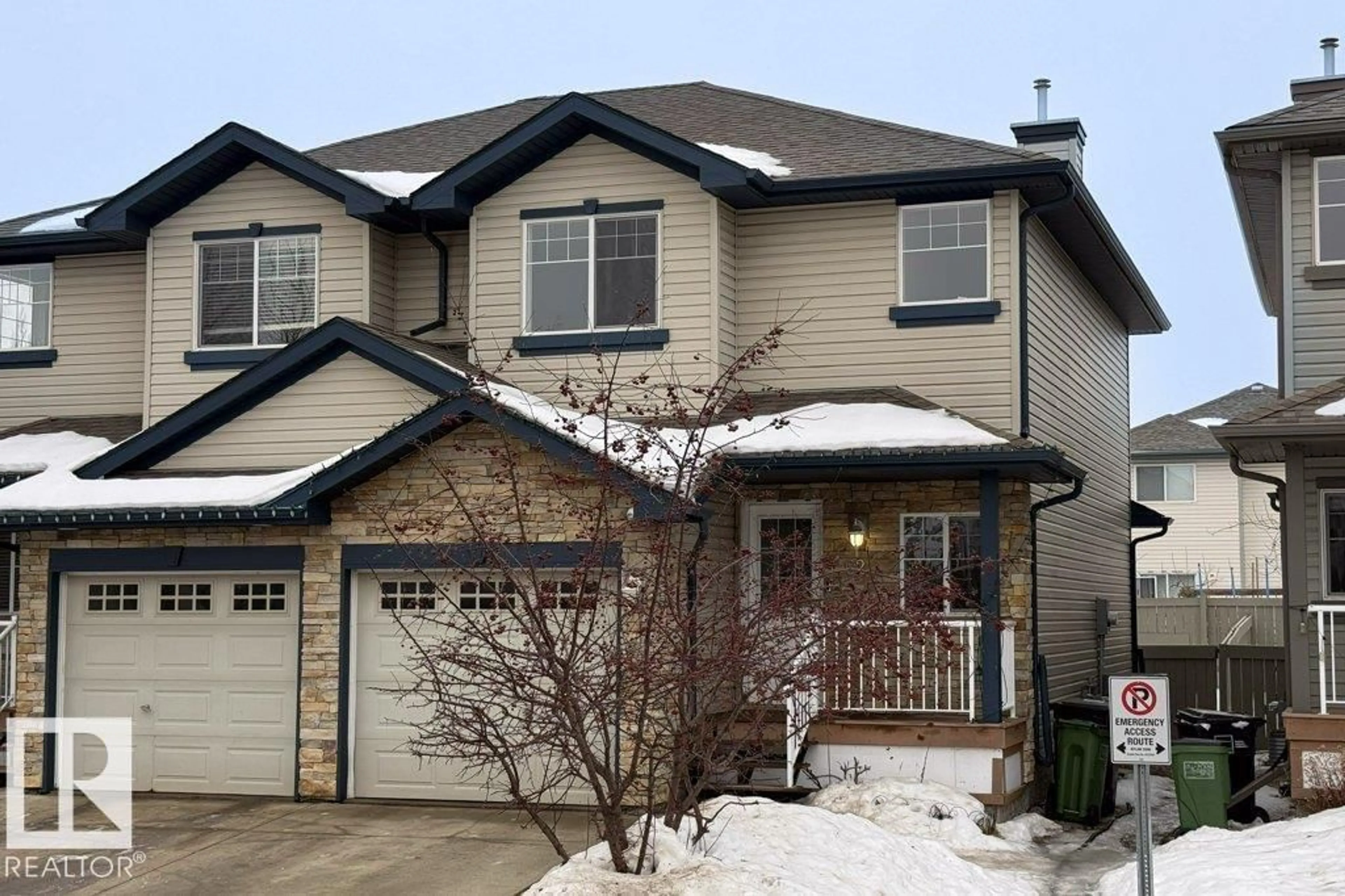 Home with vinyl exterior material, street for #62 - 6304 SANDIN WY, Edmonton Alberta T6R0J8