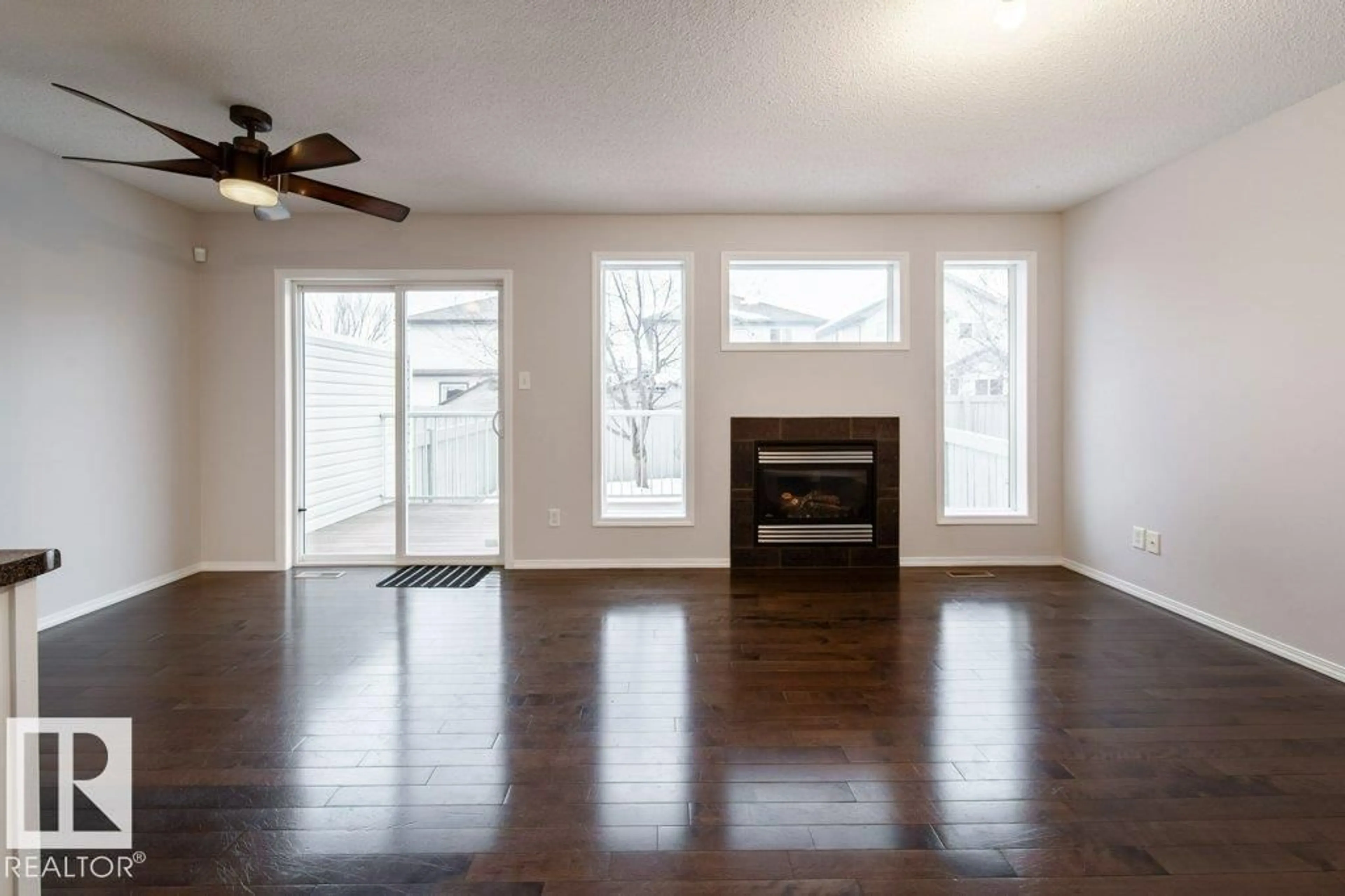 Living room with furniture, wood/laminate floor for #62 - 6304 SANDIN WY, Edmonton Alberta T6R0J8