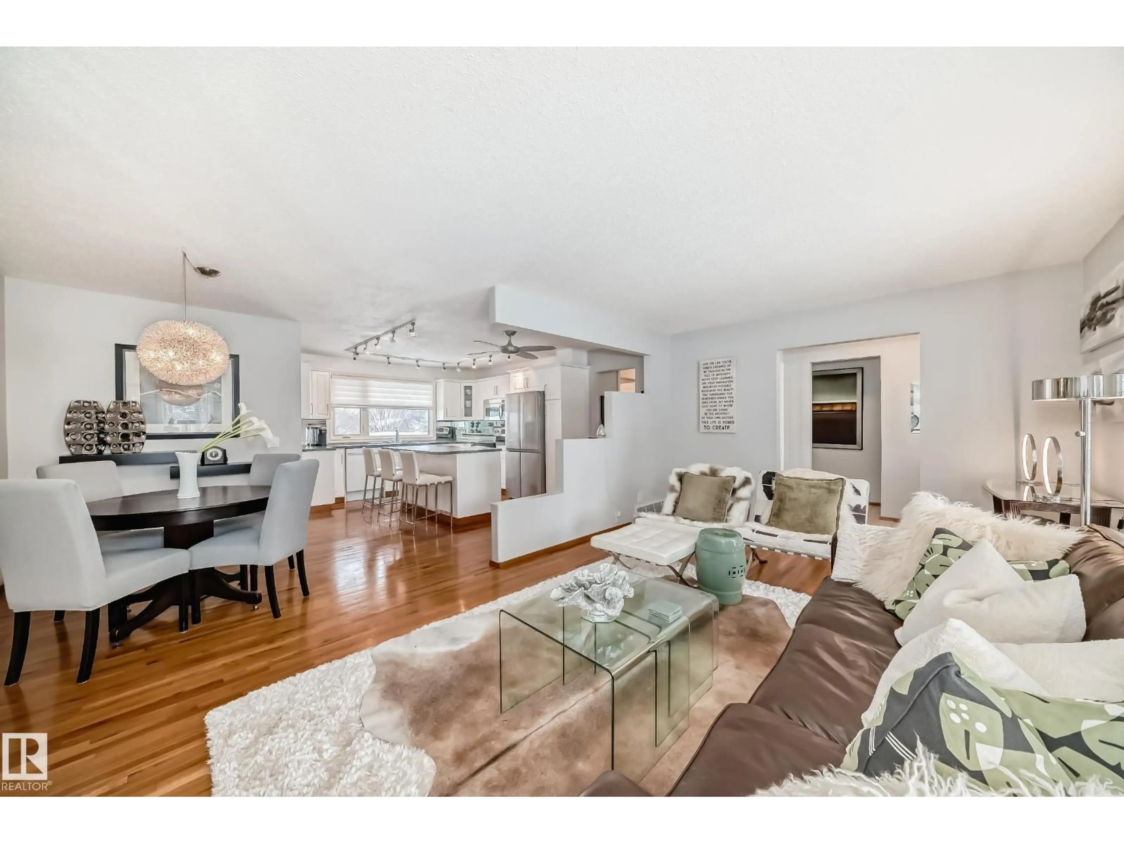 Living room with furniture, wood/laminate floor for 25 GRAHAM AV, St. Albert Alberta T8N3B7